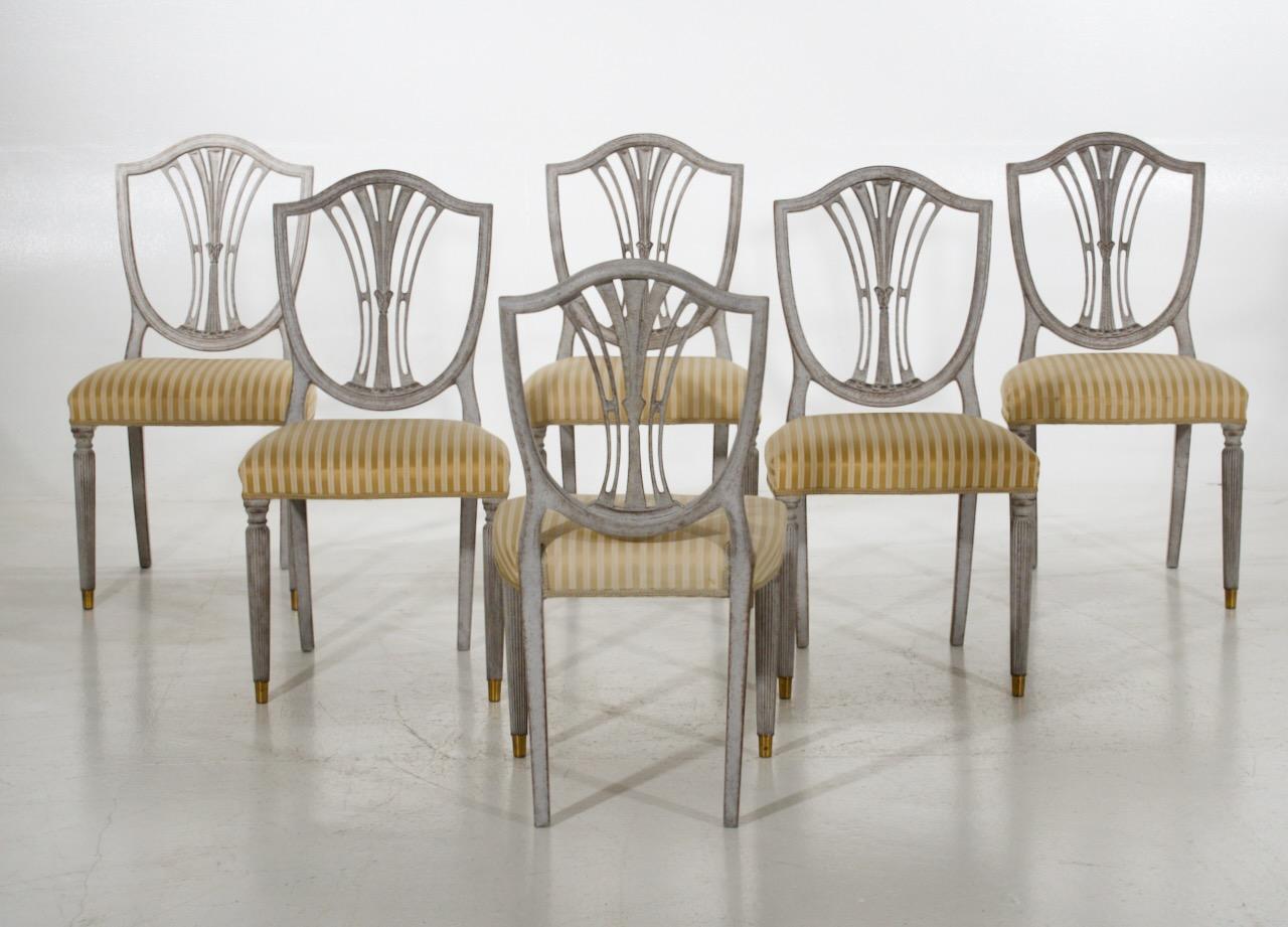 Set of six Gustavian style chairs, richly carved, early 20th century.