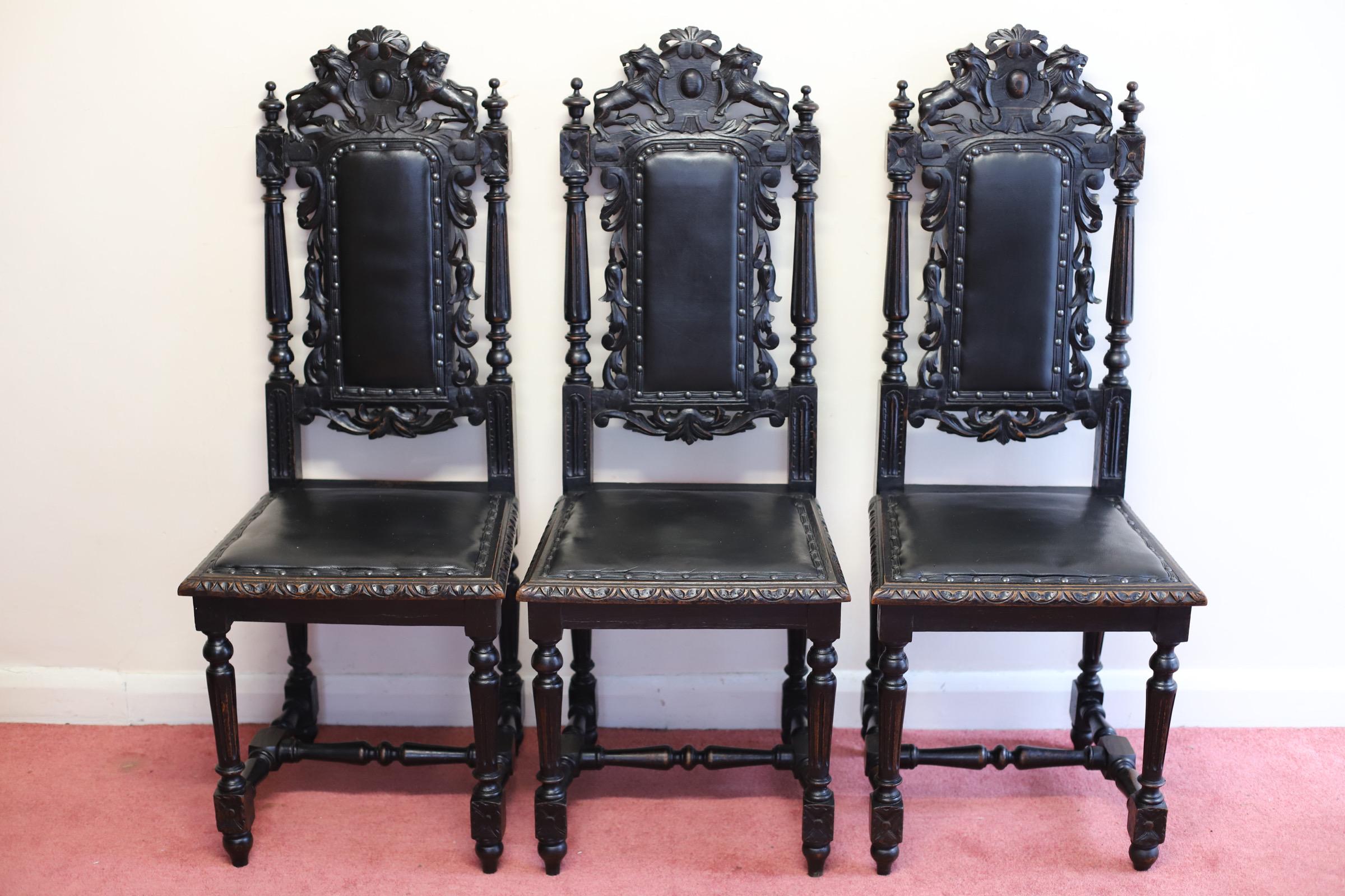 Set of six Hand- Carved Lion Terminal Victorian Dining Chairs.
We are delighted to offer for sale this stunning set of six early Victorian hand-carved oak dining chairs made in the Jacobean manor.
A set of six early Victorian dark oak black painted