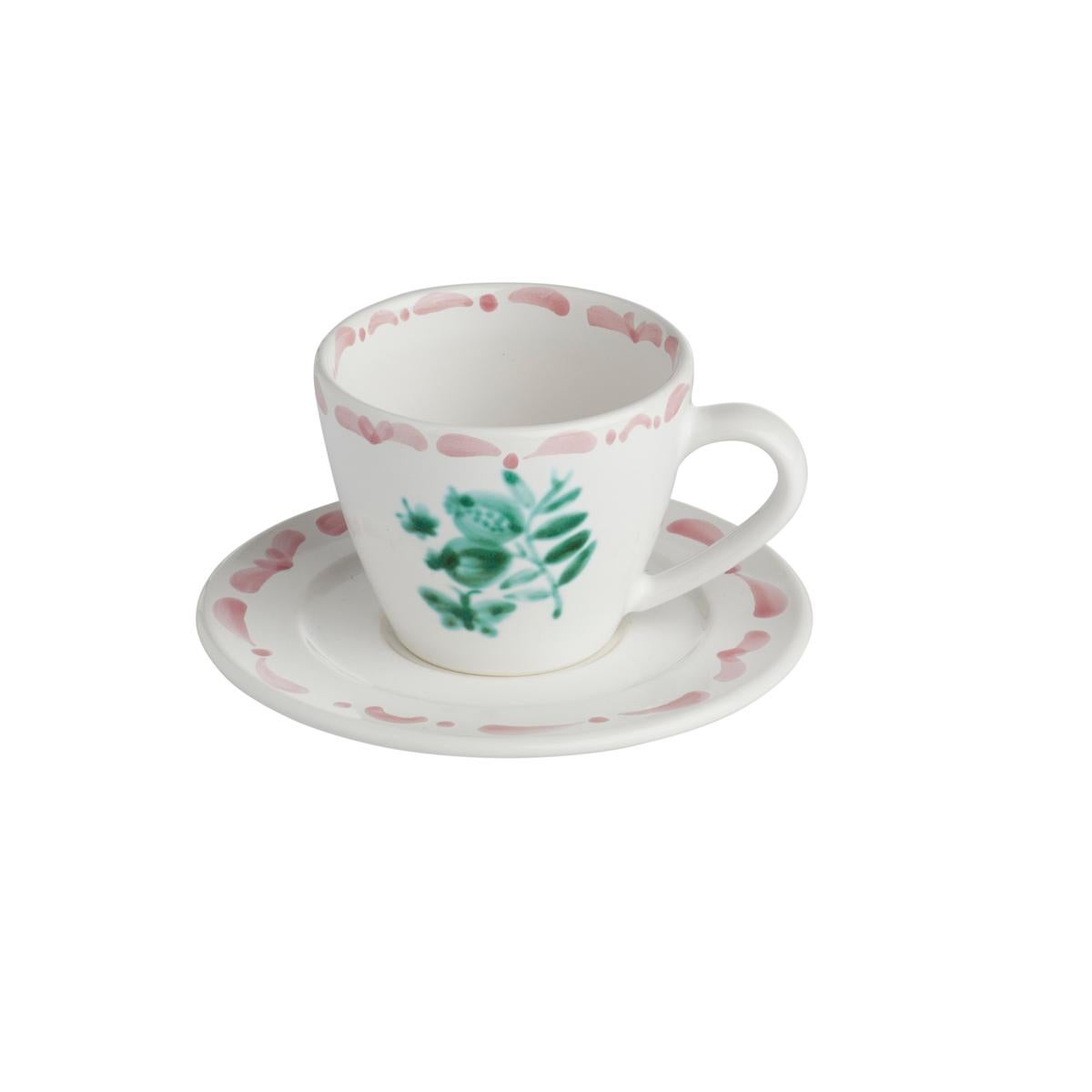 Set of six hands-free painted ceramic cups with saucers in country style. Decorated with a handpainted green pomegranate decor in the center and a hands-free painted garlande in pink. The garlande can be ordered in different colors. Produced in