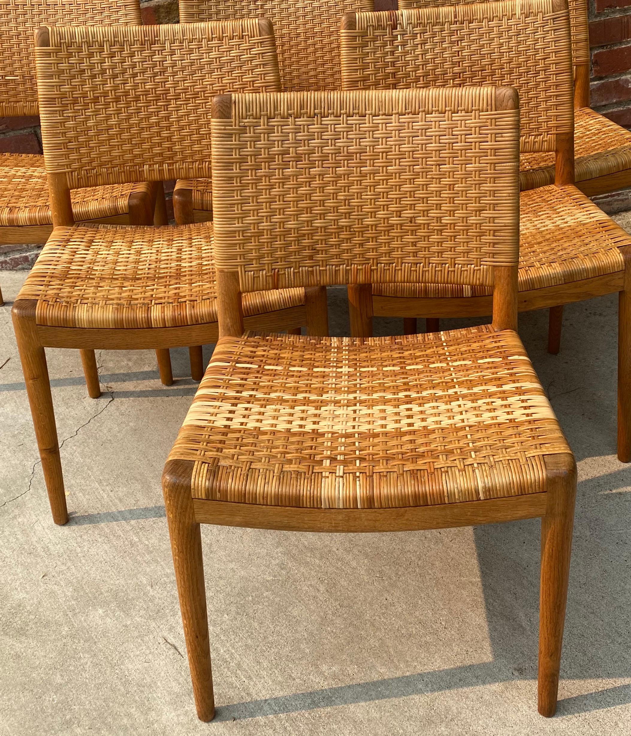 Set of six Hans Wegner for Johannes Hansen Danish modern dining chairs, circa 1960

Mid-Century Modern dining chairs

Danish oak frames with wicker seats & backs

Measures: 20