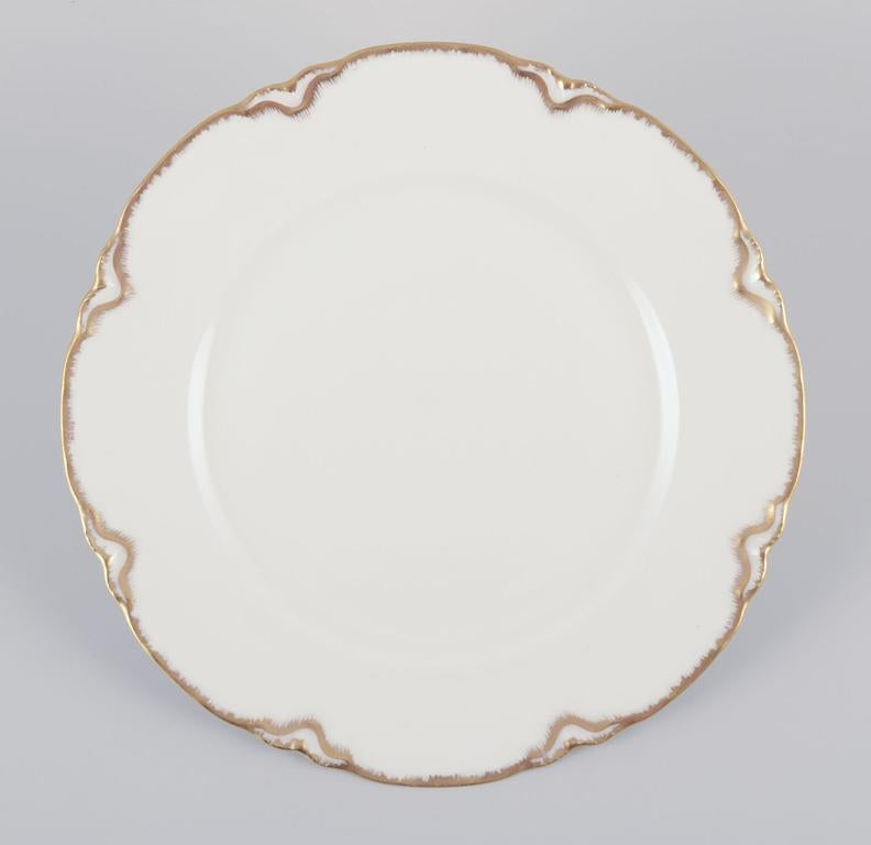 PRE-OWNED GOODS ARE EXEMPT FROM IMPORT TARIFFS FOR U.S., UK, AUSTRALIAN & CANADIAN CUSTOMERS.   
THEREFORE, NO IMPORT TARIFFS WILL BE APPLICABLE TO YOUR PURCHASE. 

A set of six ‘Haviland’ porcelain dinner plates.
Hand-decorated gold decoration,