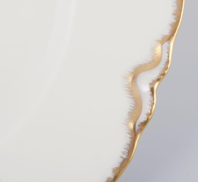 Glazed Set of six ‘Haviland’ porcelain dinner plates with gold decoration, 1930s/40s For Sale