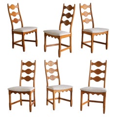 Set of Six Henning Kjærnulf Dining Chairs, Oak and Ivory Bouclé, Denmark, 1960s