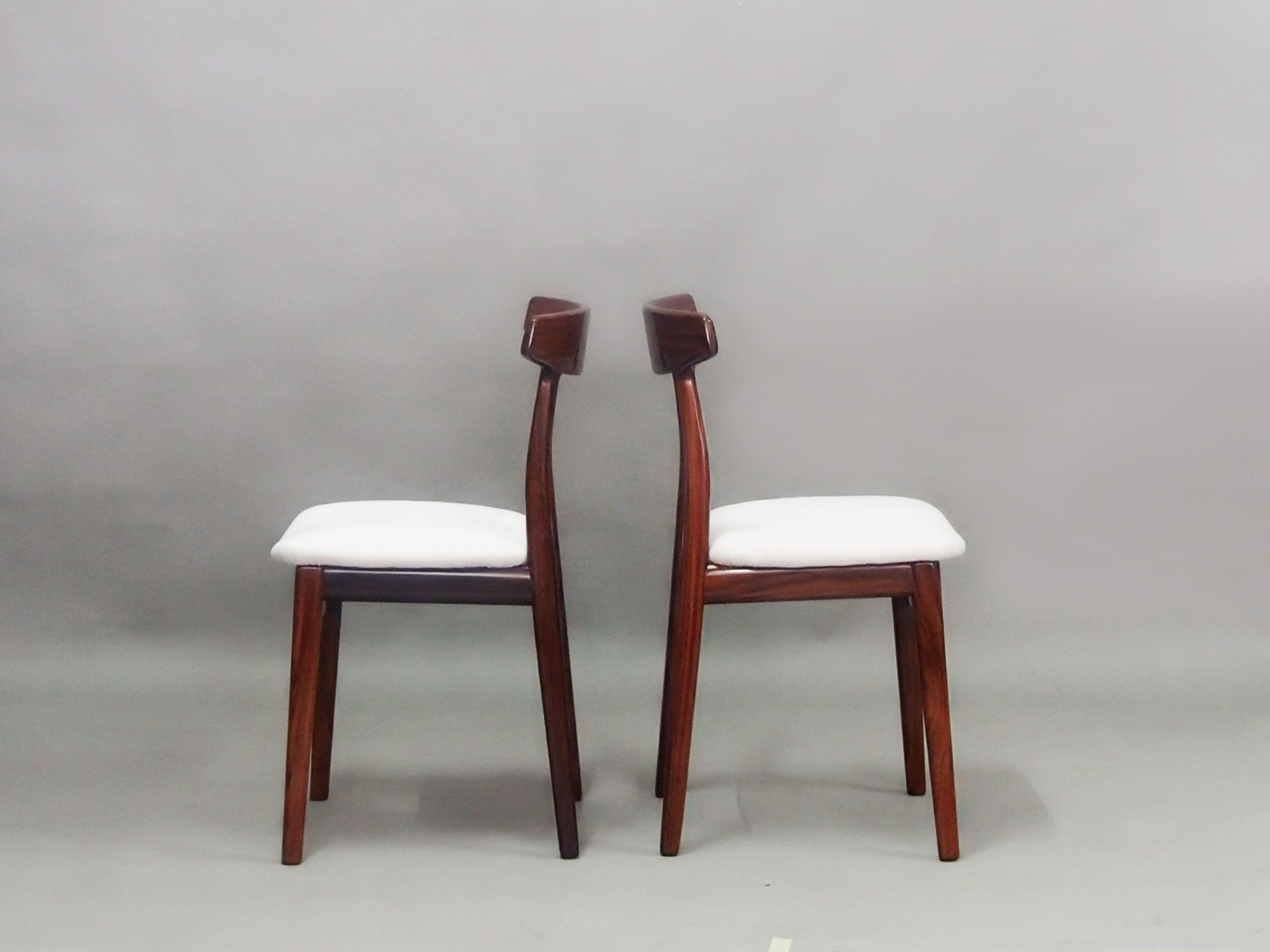 Set of six Henry Kjaernulf rosewood dining chairs model 60 produced by Bruno Hansen.