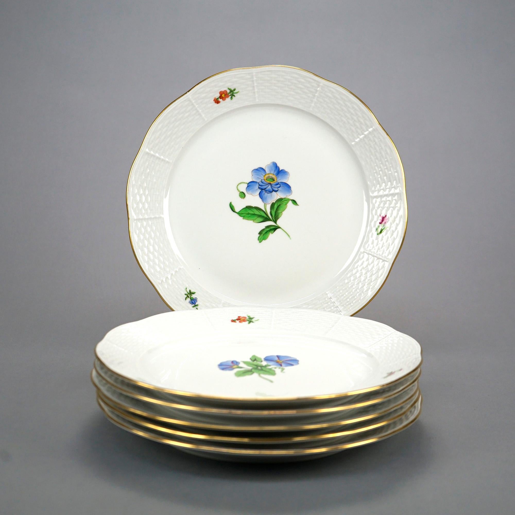 A set of six dinner plates by Herend offer fine china with floral decorated well and gilt rim, en verso maker mark as photographed, 20th century

Measures- 1''H x 10''W x 10''D.