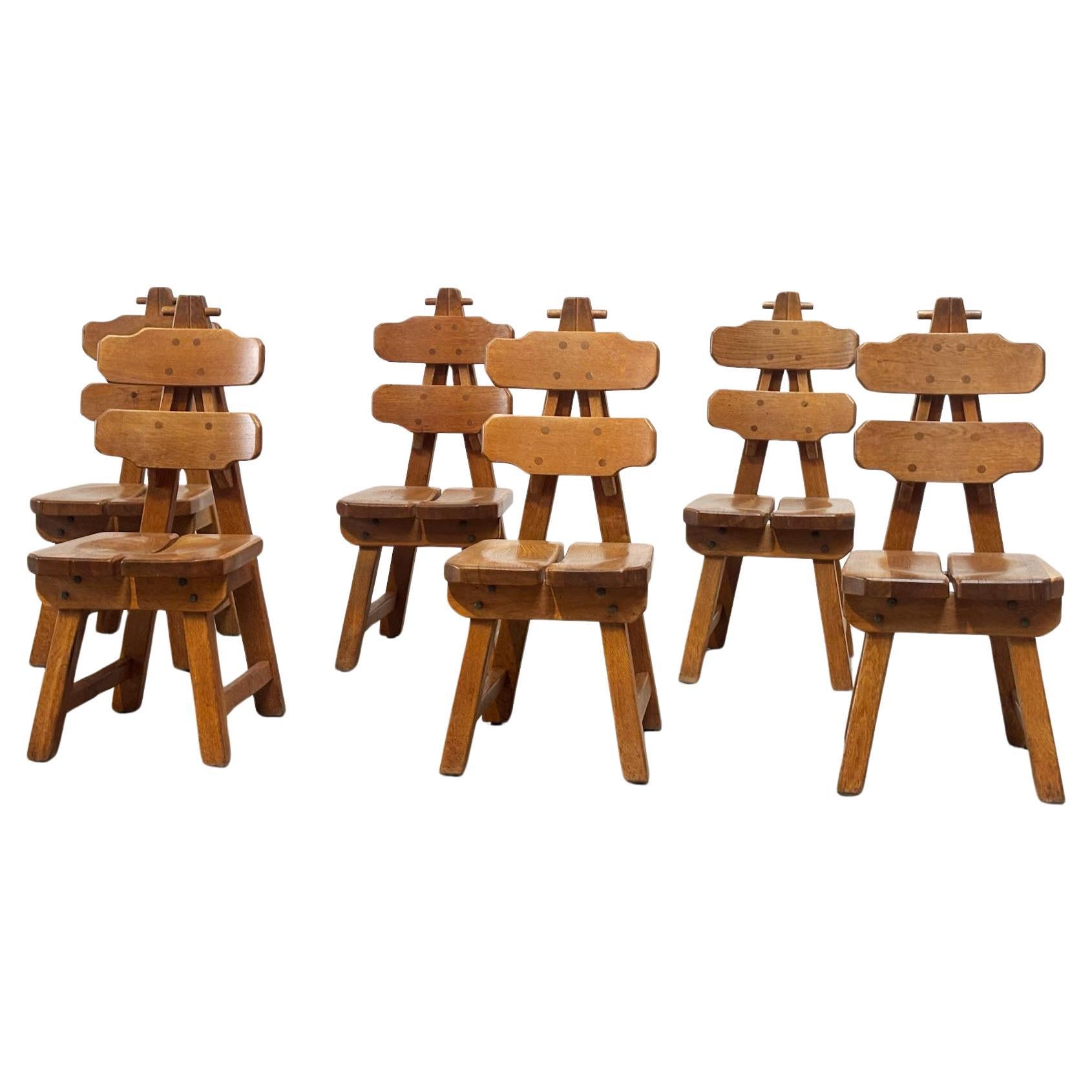 Set of six high back brutalist dining chairs For Sale