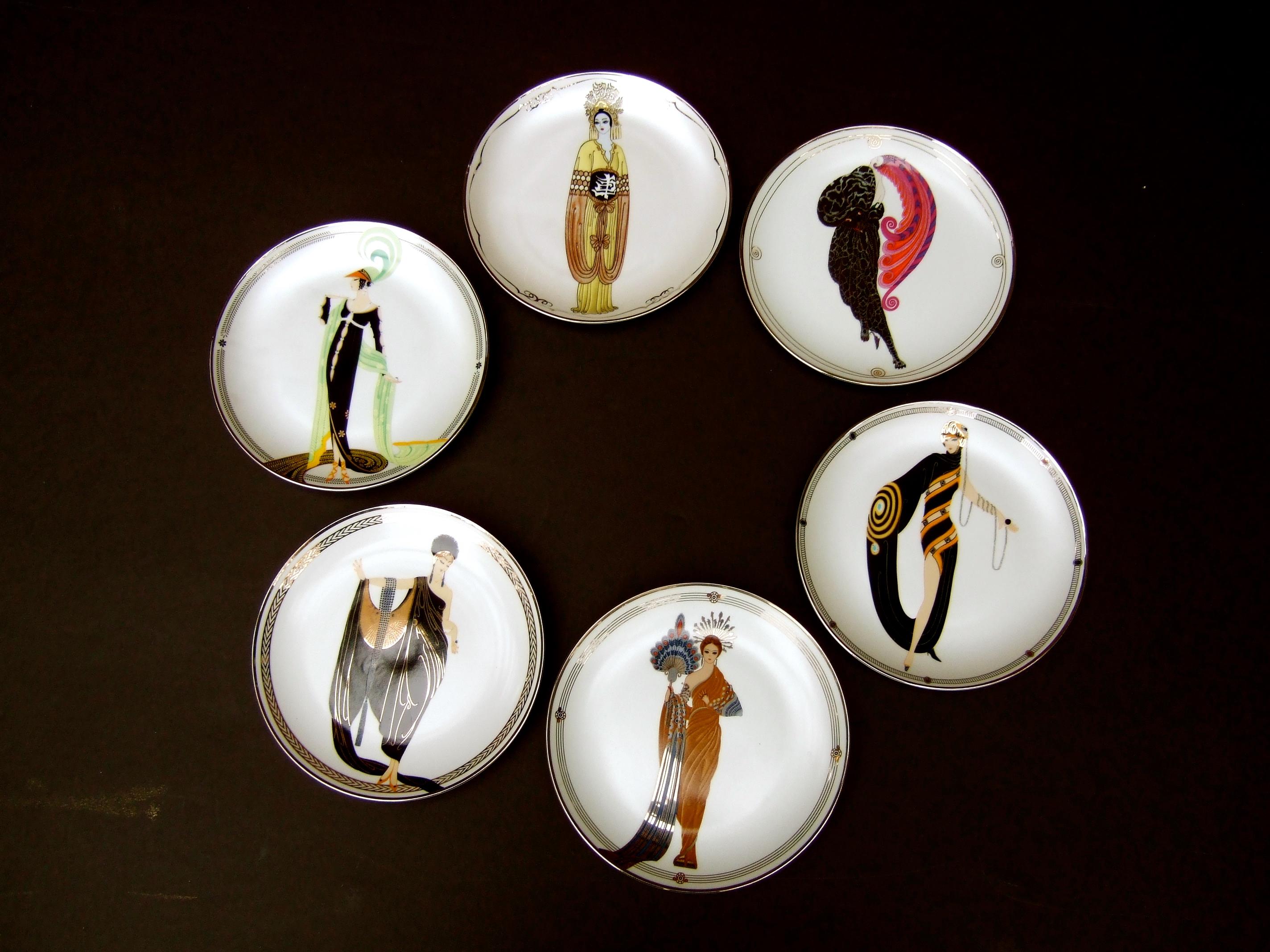 Set of six House of Erte' numbered porcelain ceramic decorative plates c 1980s
The six decorative porcelain plates are designed with an elegant stylized
art deco woman from the Erte' archives

The designs have been issued by the House of Erte' for