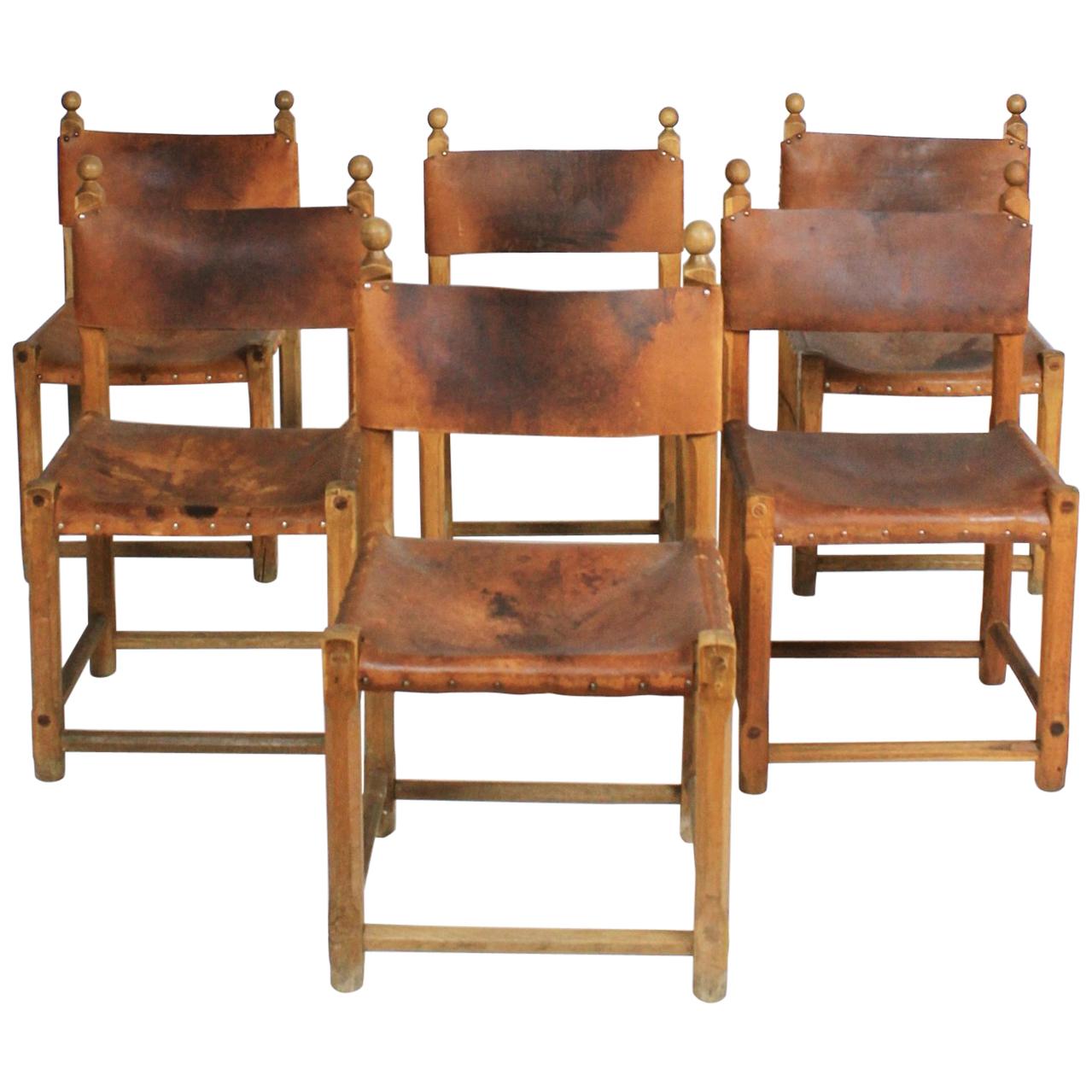 Set of Six Hungarian Folk Art Rustic Carved Oak and Leather Dining Chairs For Sale