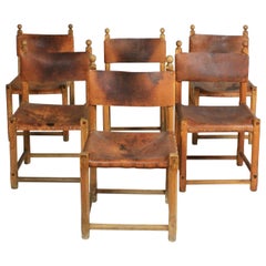 Set of Six Hungarian Folk Art Rustic Carved Oak and Leather Dining Chairs