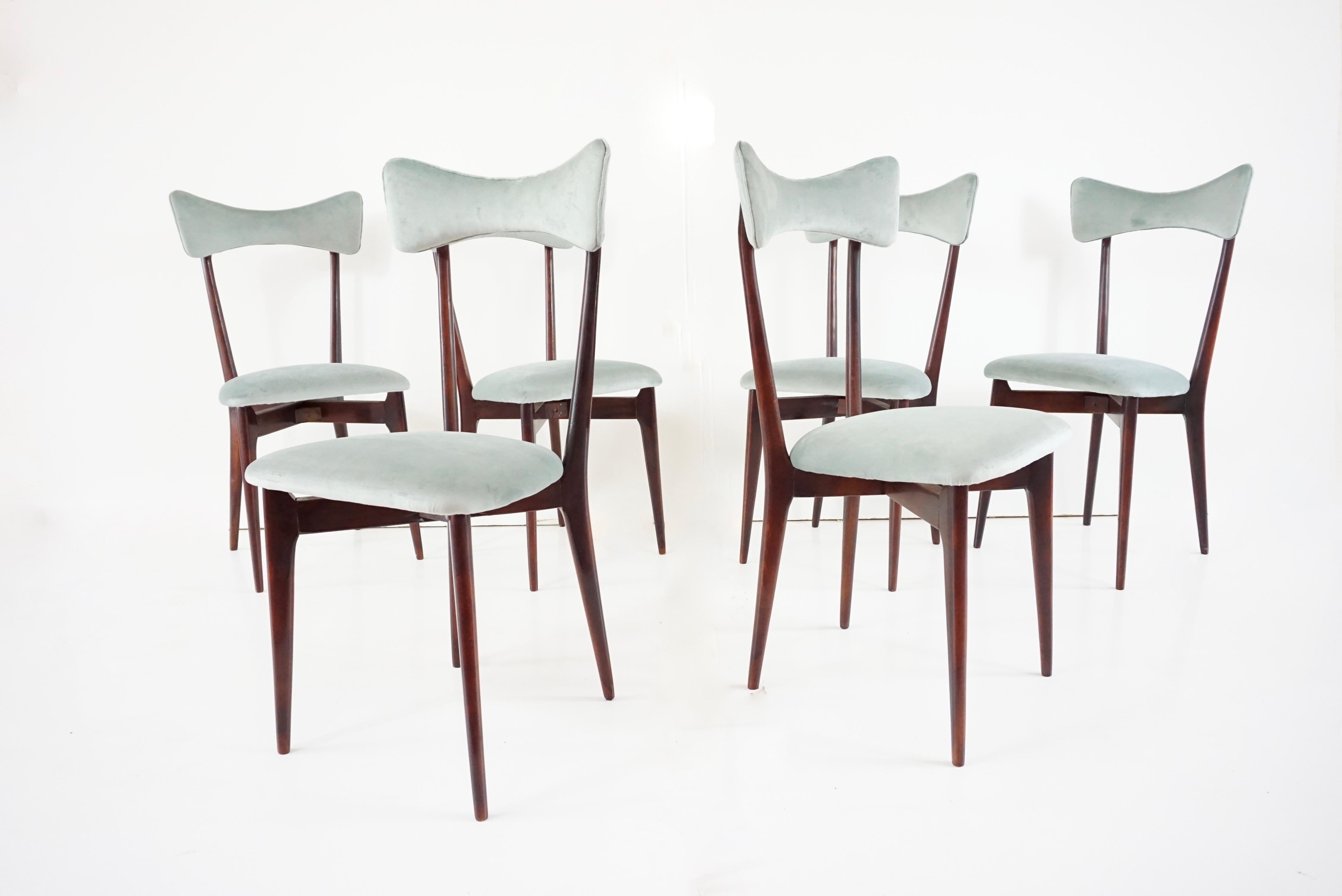 Set of iconic Ico & Luisa Parisi dining chairs
manufactured by Ariberto Colombo, Cantù, circa 1952
this version with a wooden backrest is a later version;
the original version is with a seat pad covered with red synthetic leather then re-upholstery