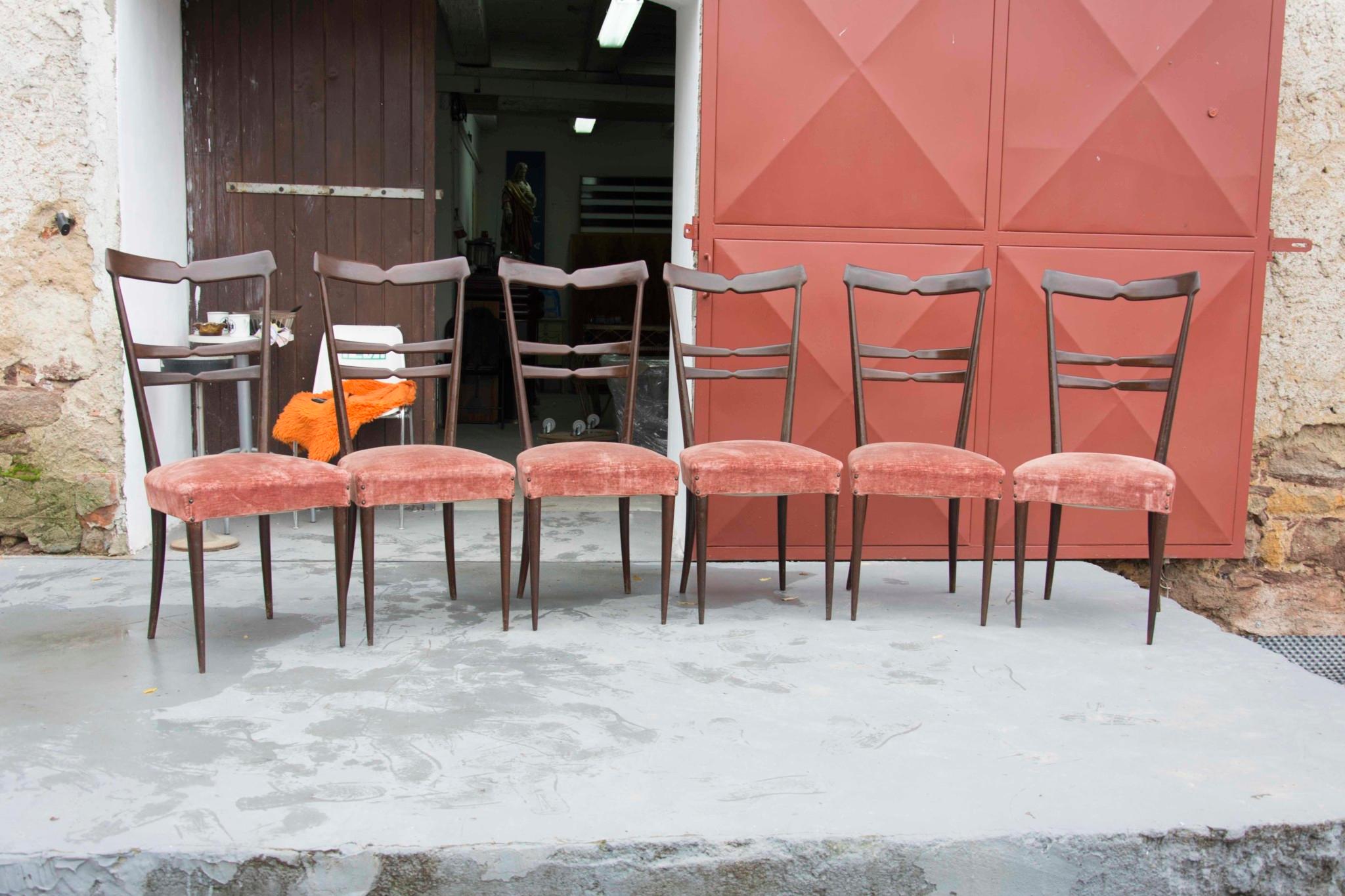 Set of six Italian midcentury dining chairs in the style of Ico Parisi. It was produced in the 1950s. Polished veneer wooden structure and original suede fabric. The chairs features a very simple and attractive design typical of this Italian design