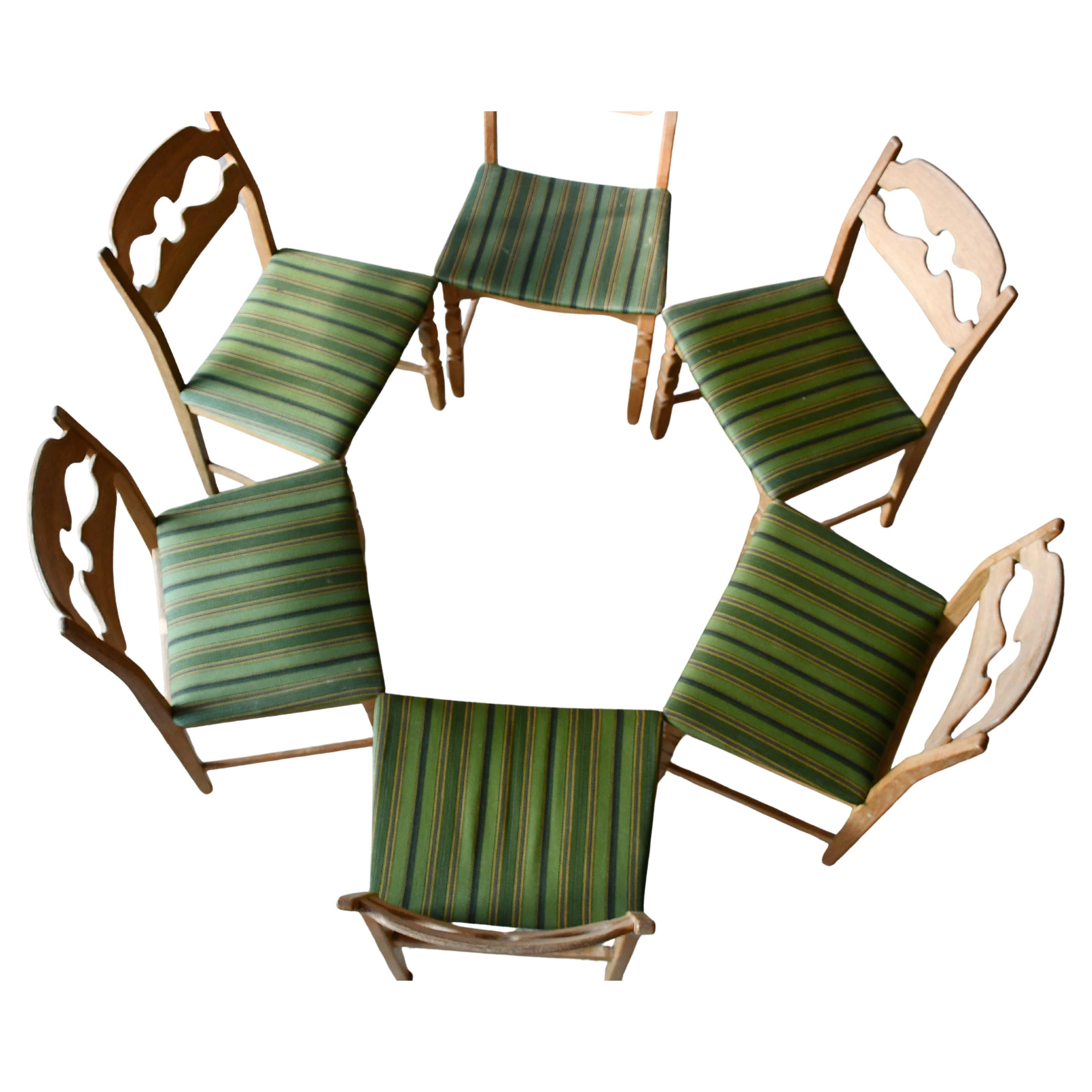 Set of six Iconic Razorblade Dining Chairs Carved Oak by Henry Kjærnulf 60's