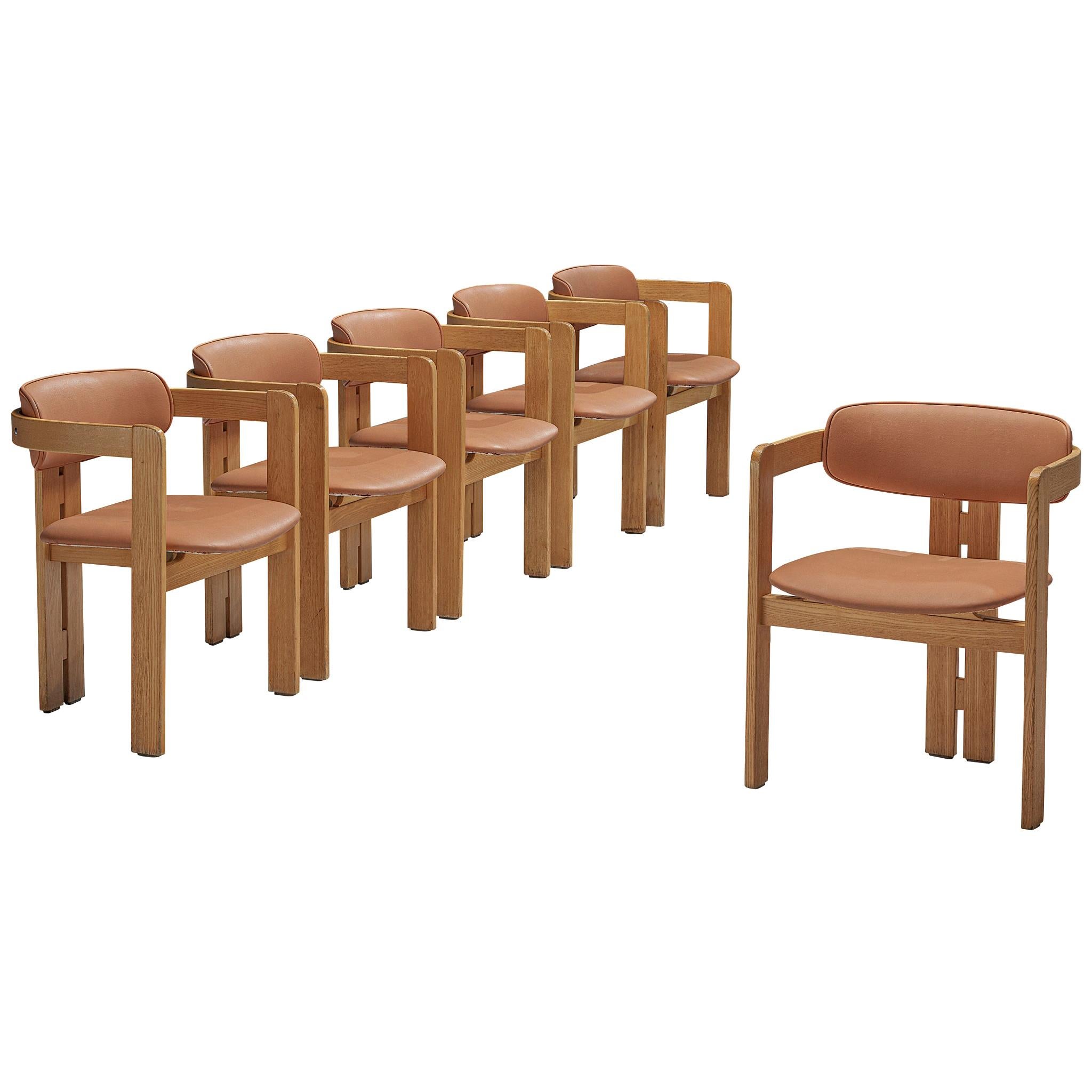 Set of six dining chairs, beech, leatherette, Italy, 1970s

This set of six Italian dining chairs has a strong resemblance to Augusto Savinis 'Pamplona' Chair (1965) and Afra & Tobia Scrapas 'Pigreco' chair (1959/60) yet the designs are different