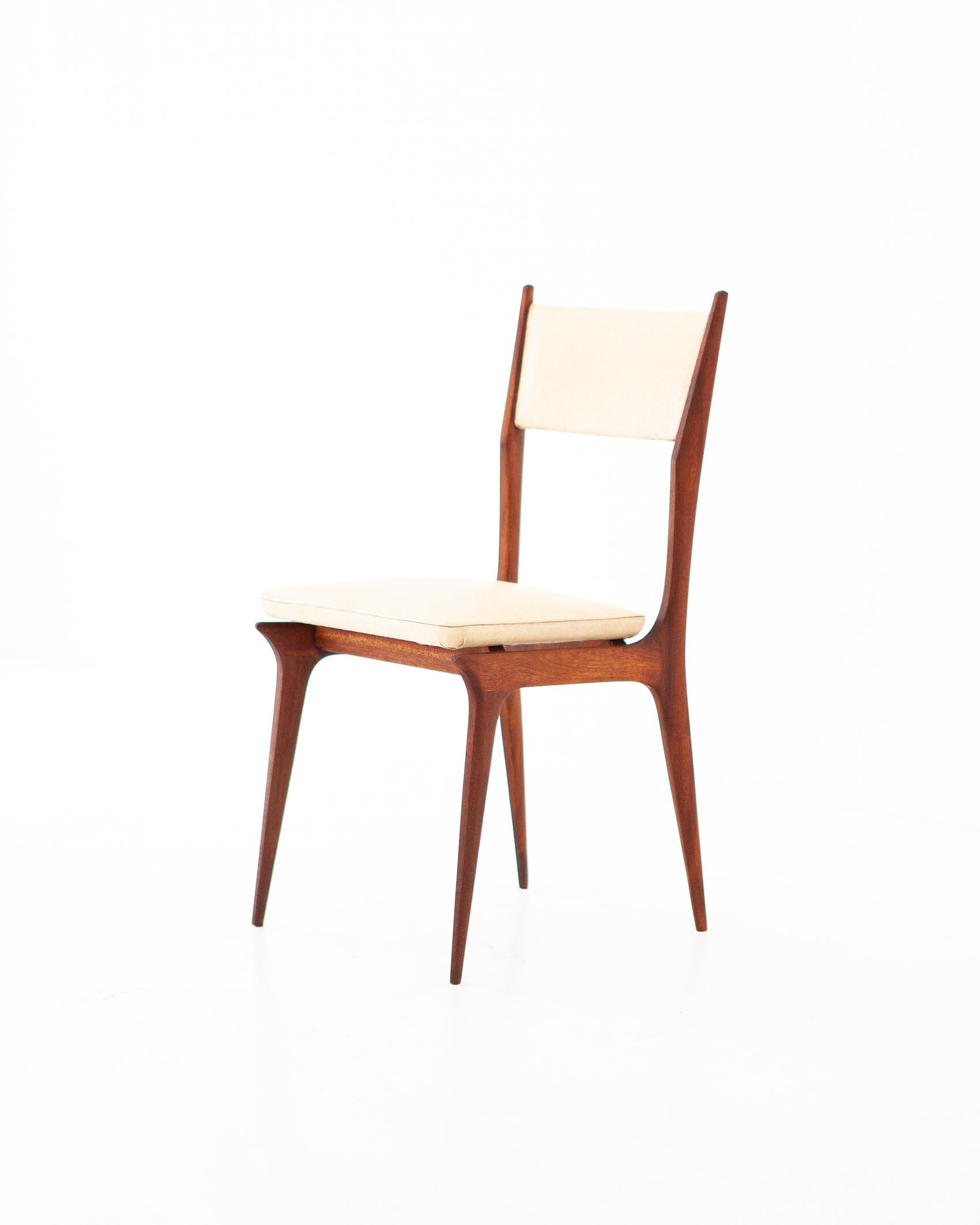 This set of six chairs was manufactured in Italy during the 1950s

The Mid-Century Modern design of this chair is attributed to the Italian architect Carlo de Carli

The frame is made of solid and high quality mahogany wood, this is completely