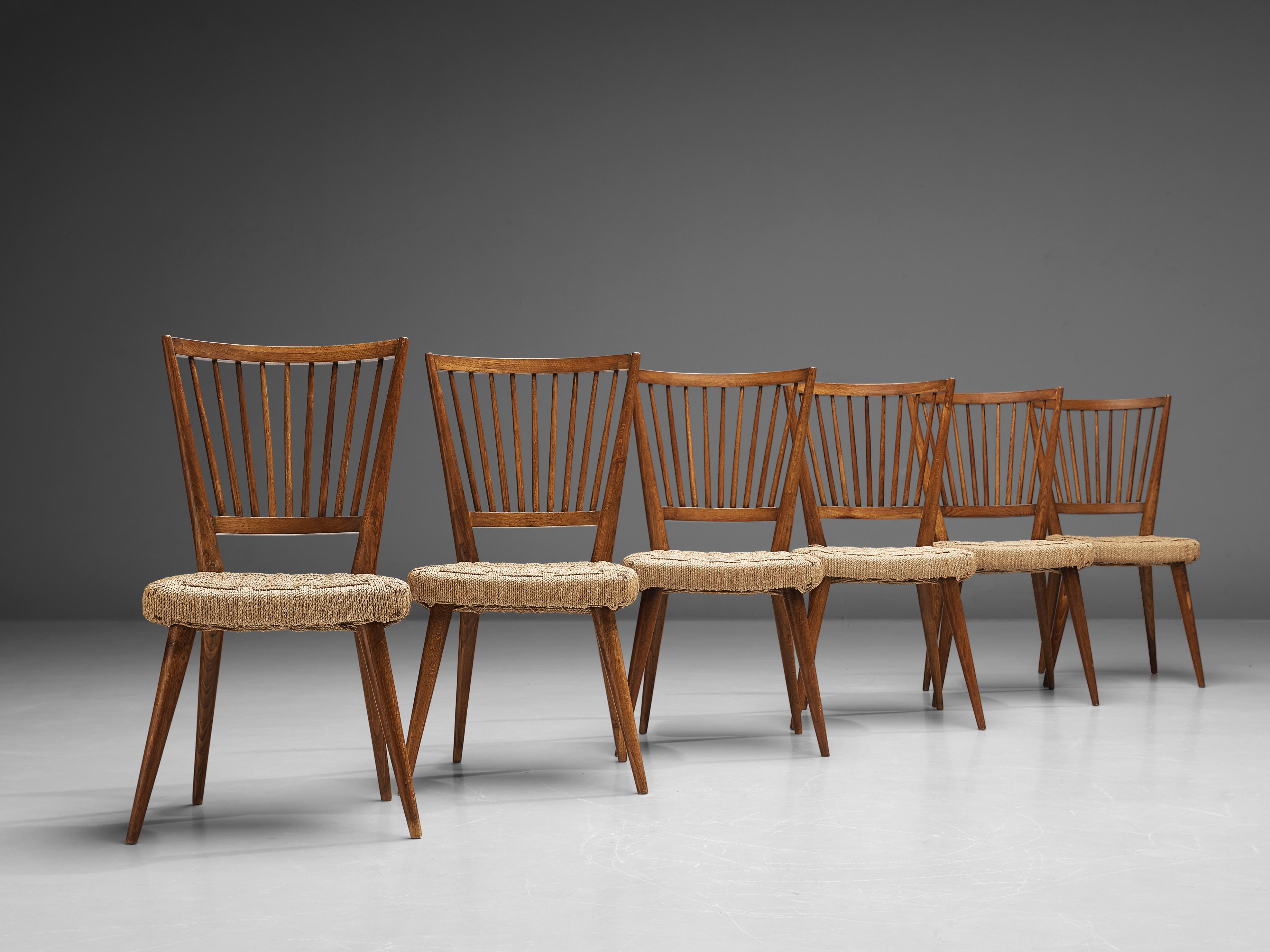 Milieu du XXe siècle Ensemble italien de six chaises de salle à manger en chêne et en paille tressée en vente