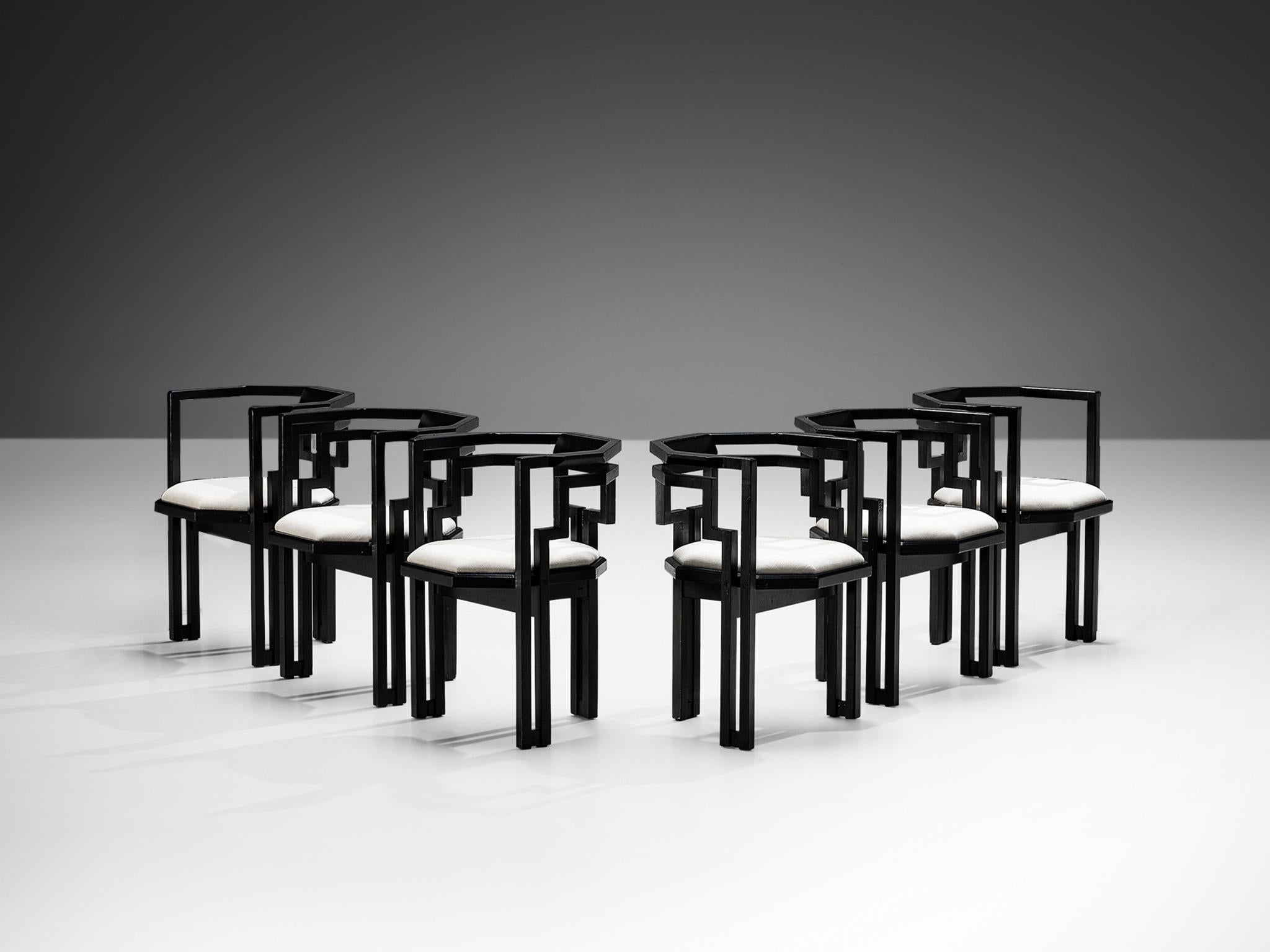 Set of six dining chairs, black lacquered oak, white fabric, Italy, 1970s.

Outstanding set of six geometric Italian dining chairs. These chairs combine a sculptural design that is simple, but very strong in lines and proportions with a luxurious