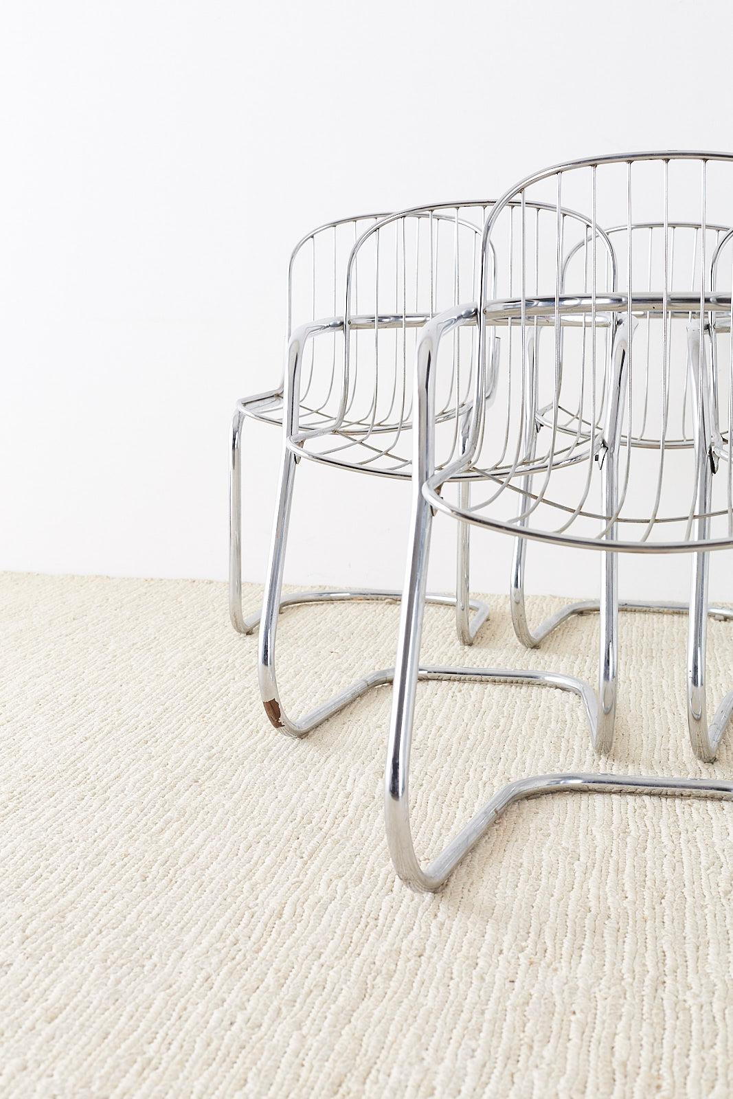 Unique set of 6 Italian chrome cantilever lounge chairs made by Gastone Rinaldi. Set consists of four armchairs and two side chairs. Gracefully curved basket style seat attached to tube cantilever frames. Original black bottom seat pads included.