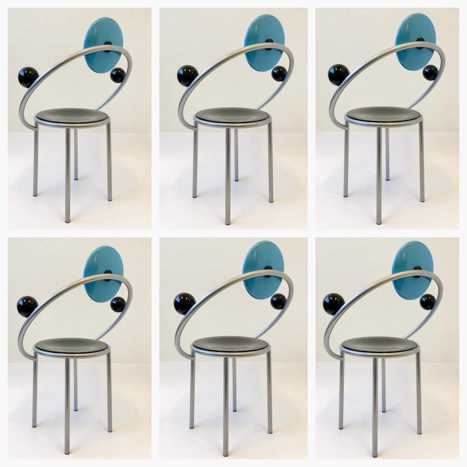 A spectacular set of six Italian Memphis “First Chair” designed by renowned Italian designer Michele De Lucci in 1983. This are in original condition. The chairs were used so they have some minor wear( please see detail photos). 

Dimension: 25.5”
