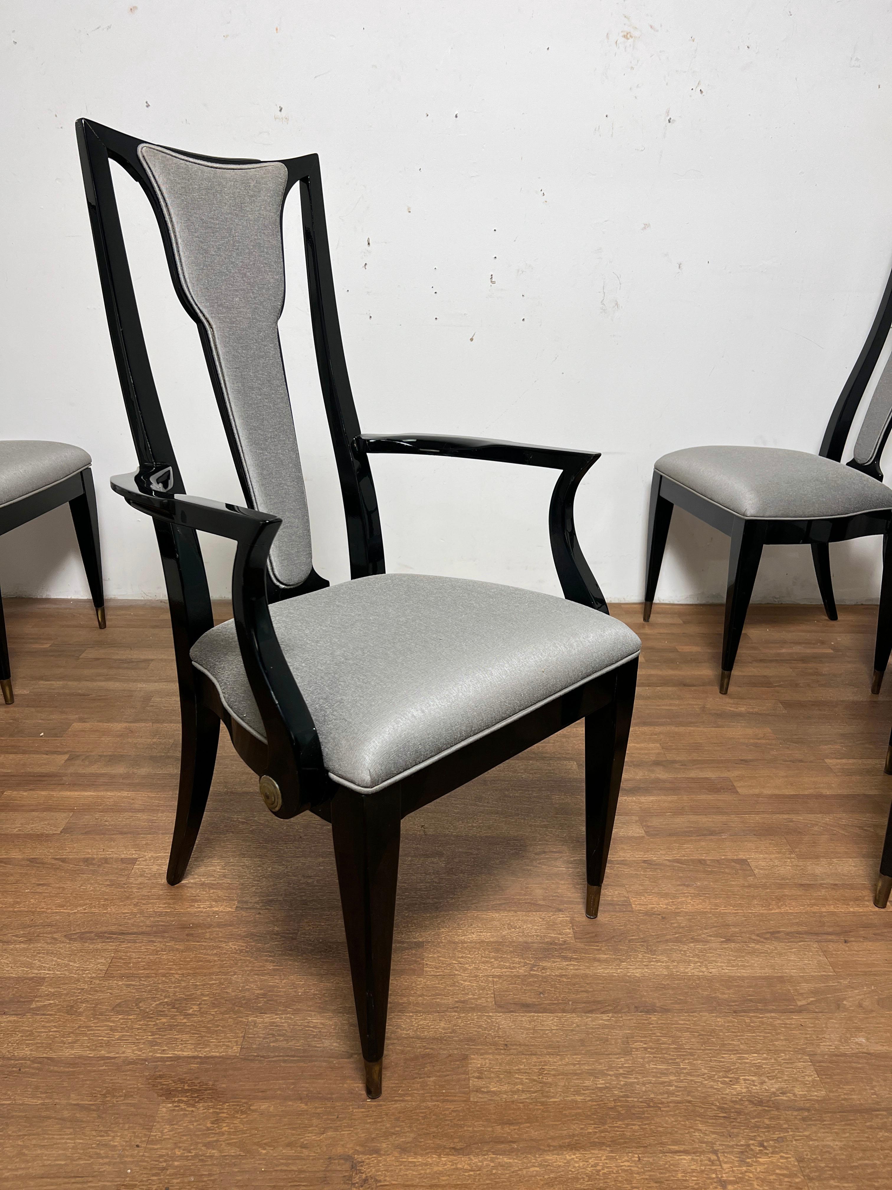 Set of six elegant high back dining chairs formerly placed in an interior designed by Ryan Korban in the early 2000s.  These stylish 21st century mid-century revival chairs have an Italian influence reminiscent of the designs of Borsani, Molino or