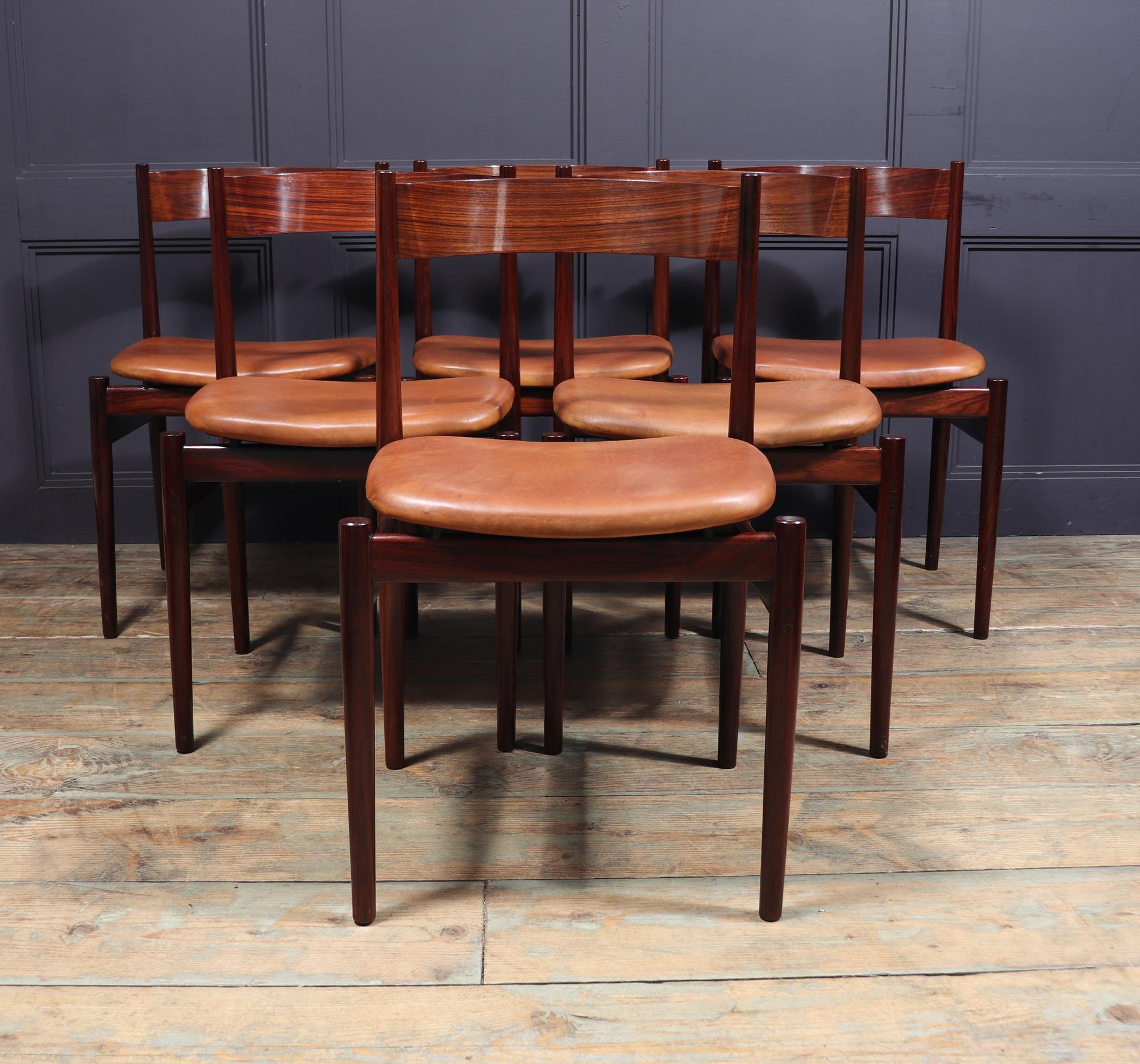 If you’re looking to add a classic Italian accent to your dining area, the Set of Six Italian Rosewood model 101 Dining Chairs produced by Cassina is the perfect choice. Crafted from rosewood and featuring turned legs, with triple doweled joints,
