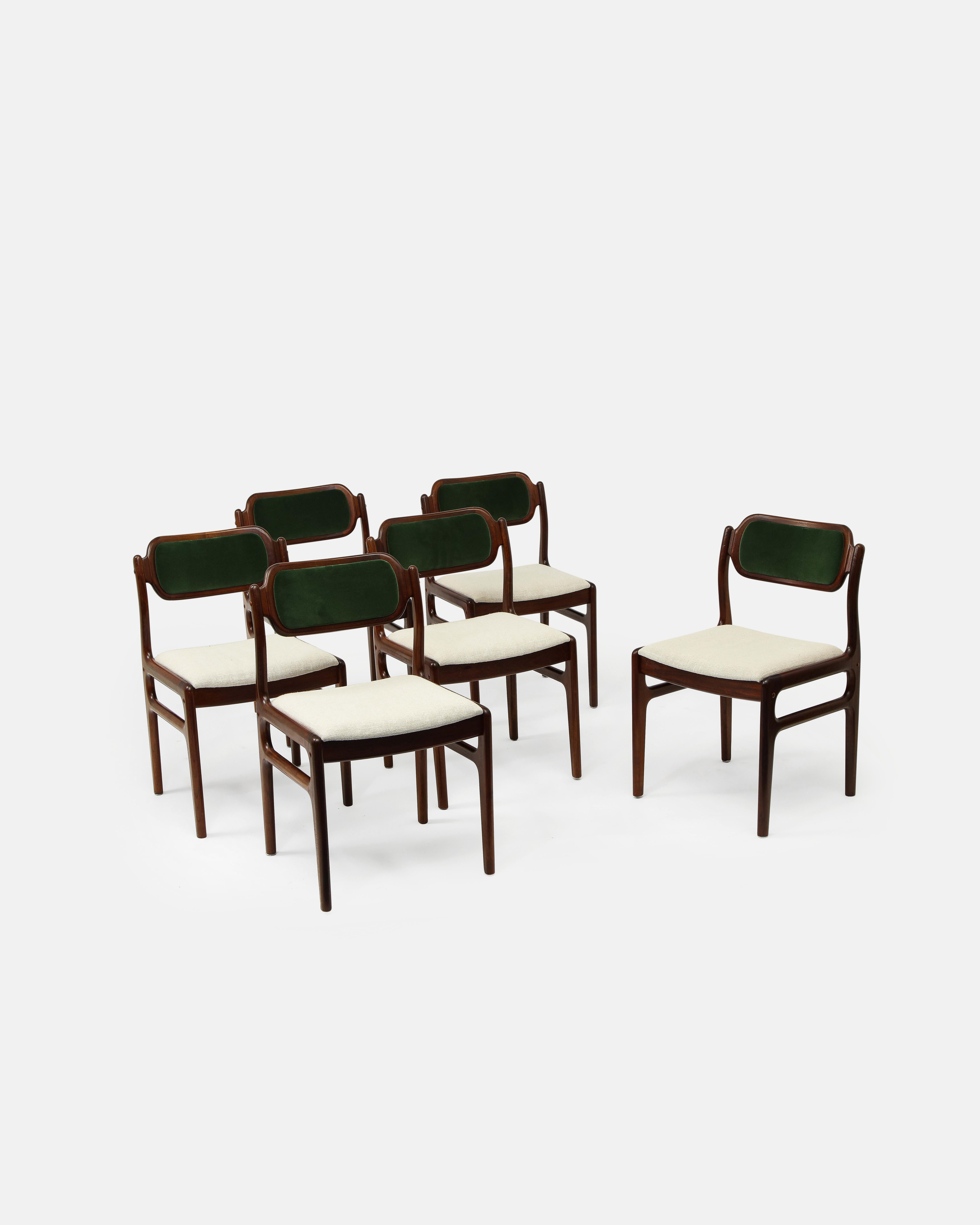 Set of six Brazilian rosewood dining room chairs attributed to Johannes Andersen.

Scandinavian Modern / Mid-Century Modern.

Recovered in two-tone fabric. 

It is believed that Andersen was born in Aarhus, Denmark in 1903 and that he