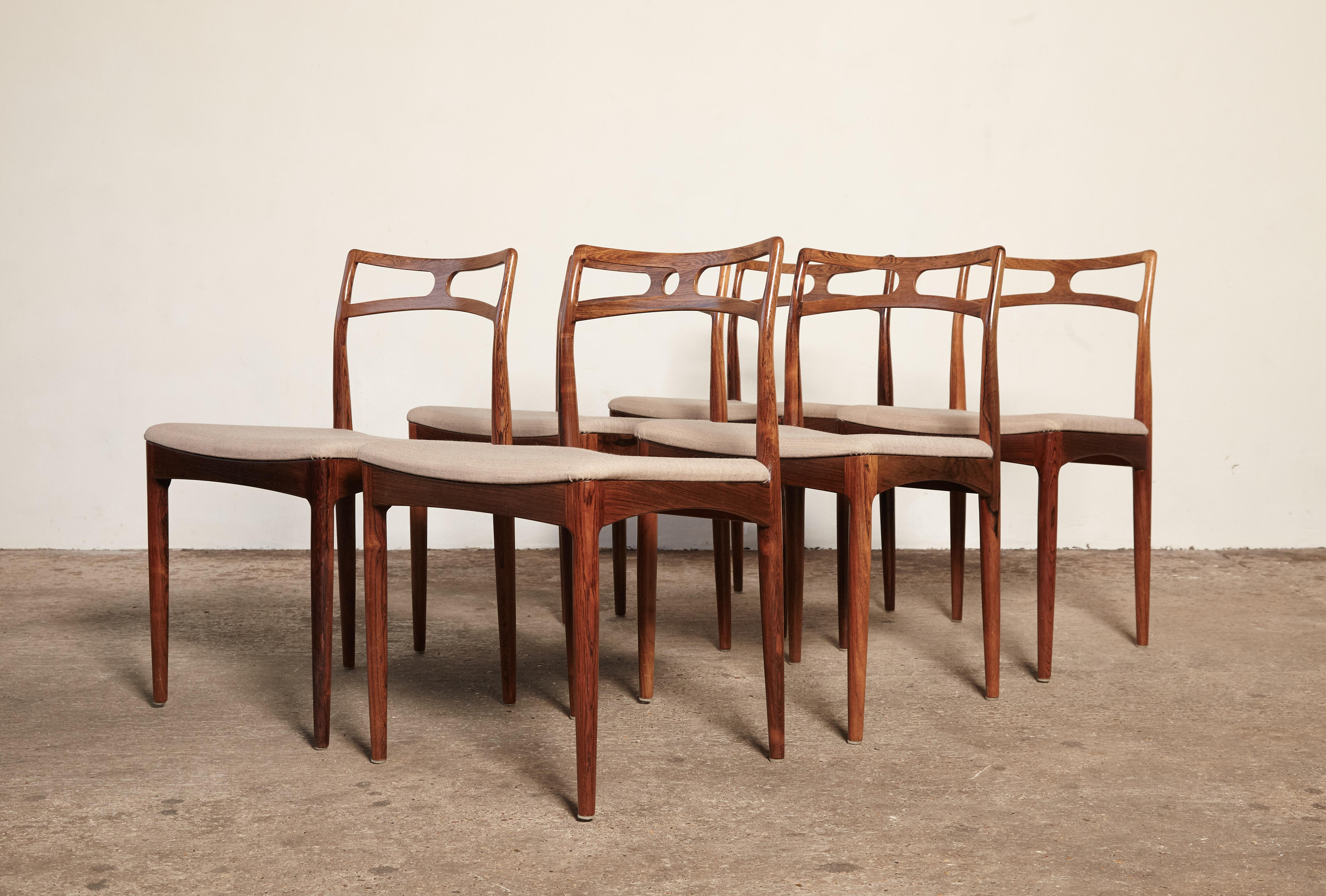 A set of six Johannes Andersen model 94 rosewood dining chairs, produced by Christian Linneberg, Denmark, 1960s. Fabric seat covers. Good vintage condition. Ships worldwide.