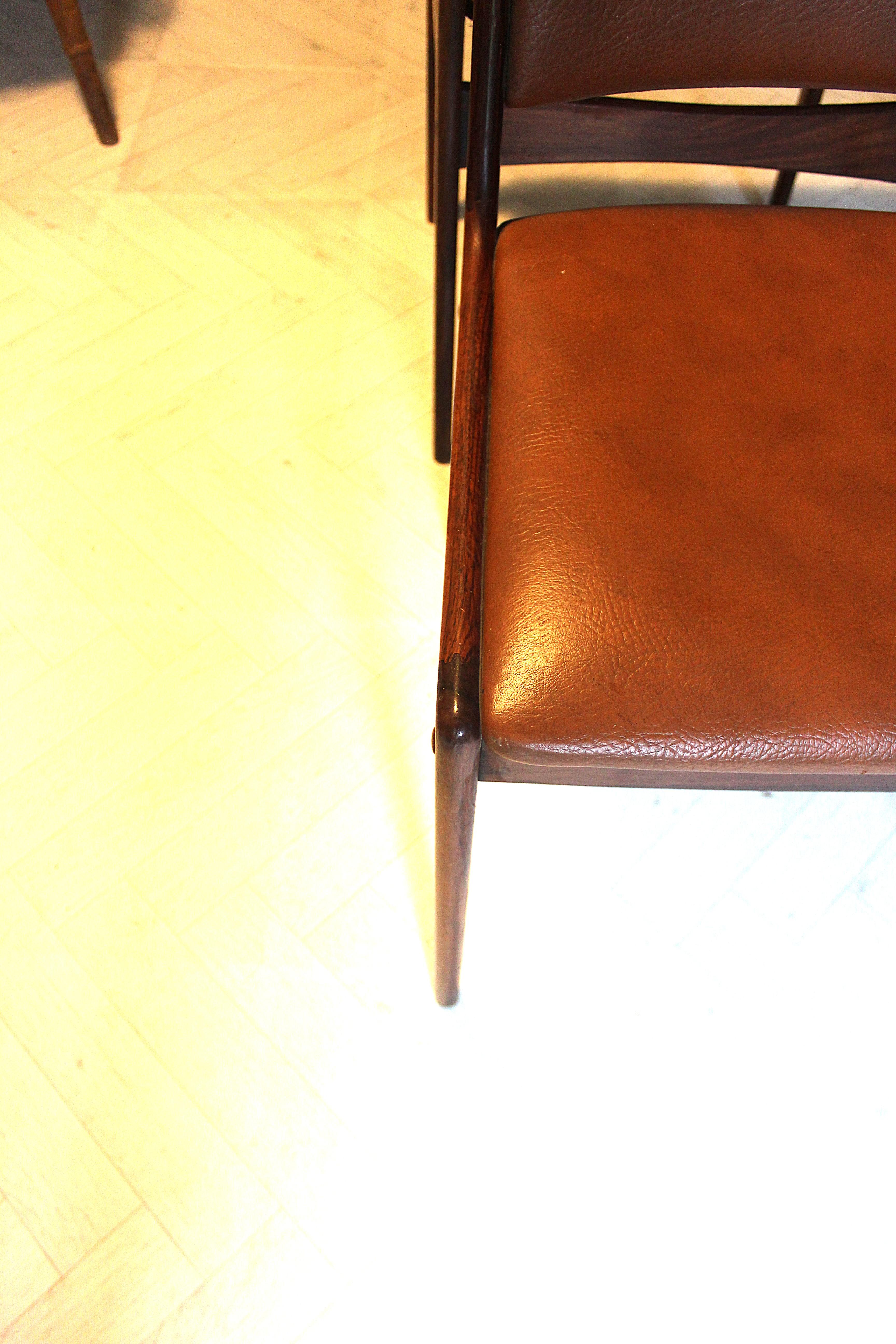 Faux Leather Mid-century rosewood dining chairs For Sale