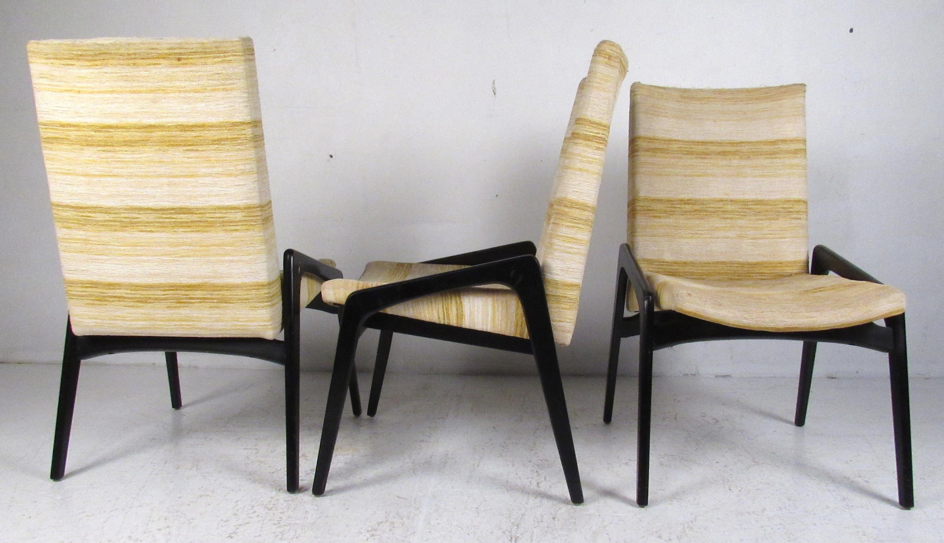 Mid-Century Modern set of six upholstered chairs with black lacquered frames by John Stuart Inc. These have clean modernist lines with unique style and form and retain the original label. Produced in 1968. Please confirm item location (NY or NJ)