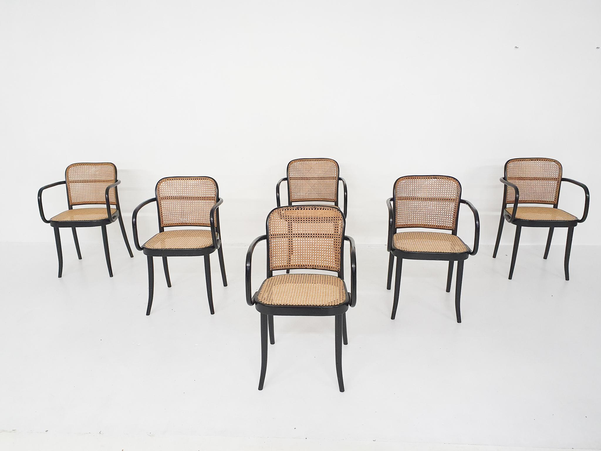Black Thonet chairs with webbing seating and back.
Some chairs have small damages in the webbing.
Marked at the bottom.