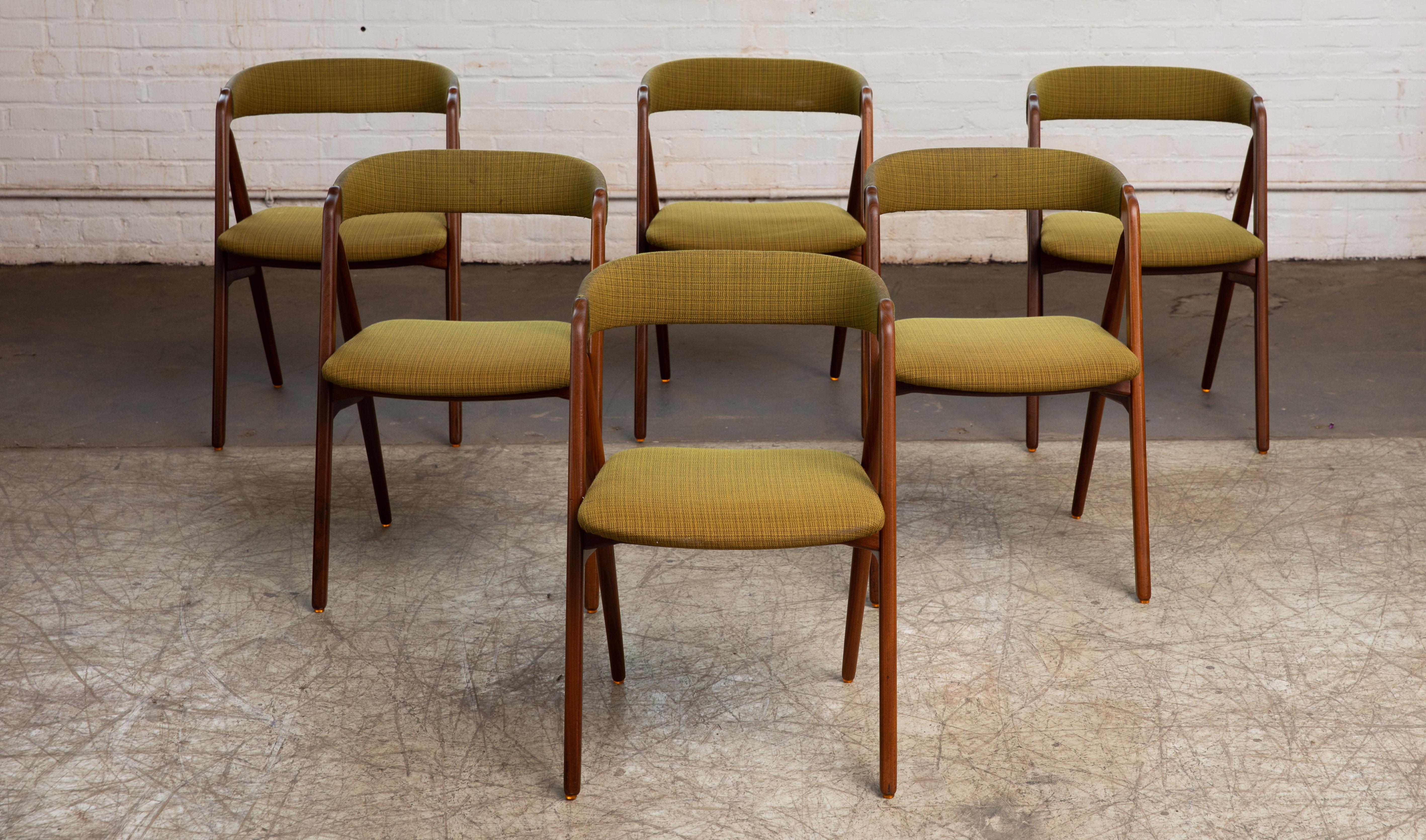 Ultra-rare set of six iconic dining room chairs known as the A-Frame model. Designed by Kai Kristiansen in 1950's and manufactured in Denmark. Many of Kai Kristainsen's designs have become iconic mainstays of the era such as his model 