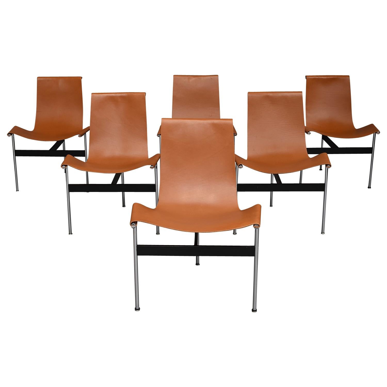 Amazing set of six three legged T-chairs by William Katavolos, Dougles Kelly and Ross Littell.
All chairs are in original and very good and beautiful condition. The leather has minor signs of use and age. Some seats have stains but nothing
