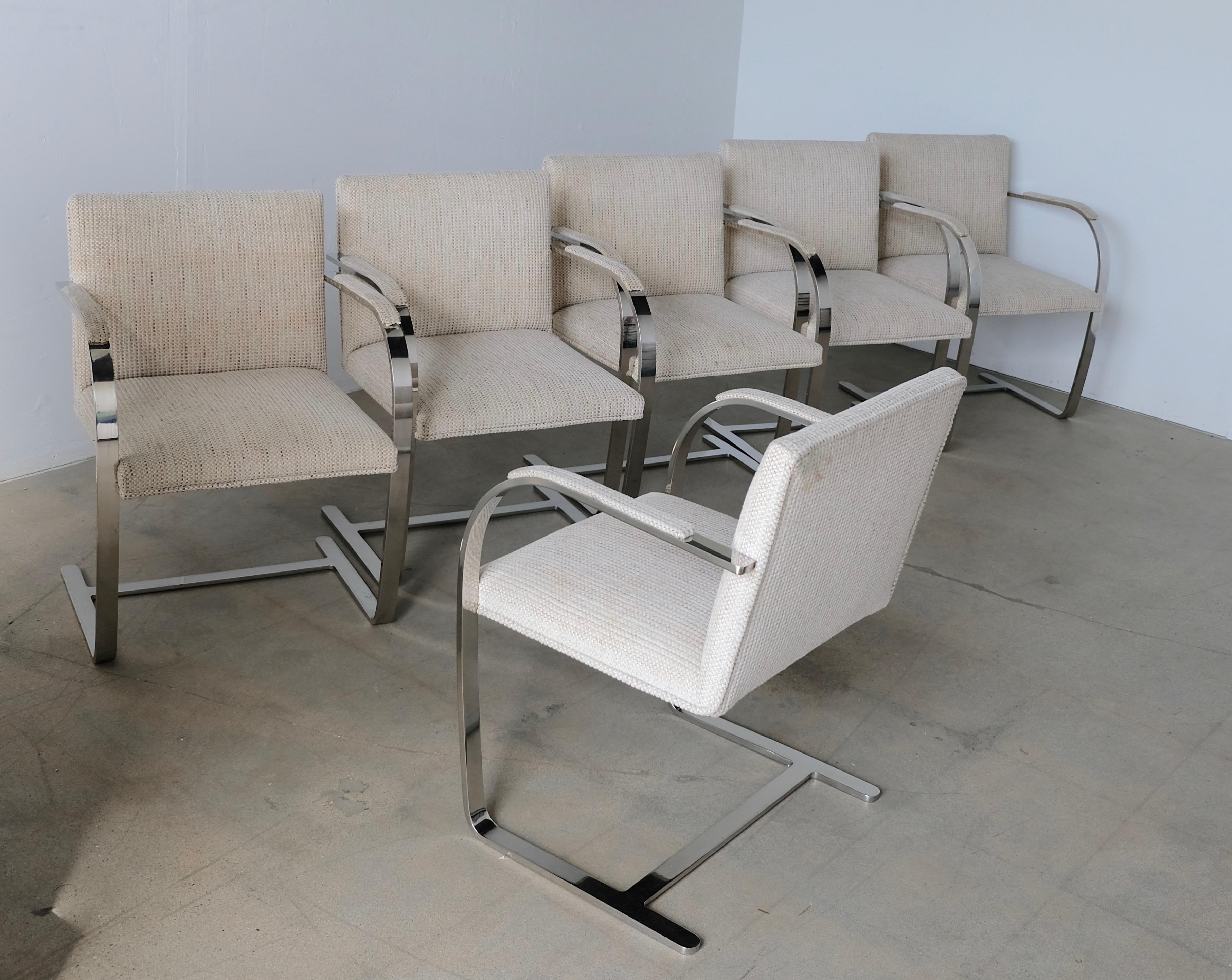 A nice vintage set of six flat bar Brno dining chairs designed by Mies van der Rohe for Knoll.
Priced to allow for new upholstery. The heavy steel frames are in good vintage condition with some wear mostly at the bases see last photos. Arm is