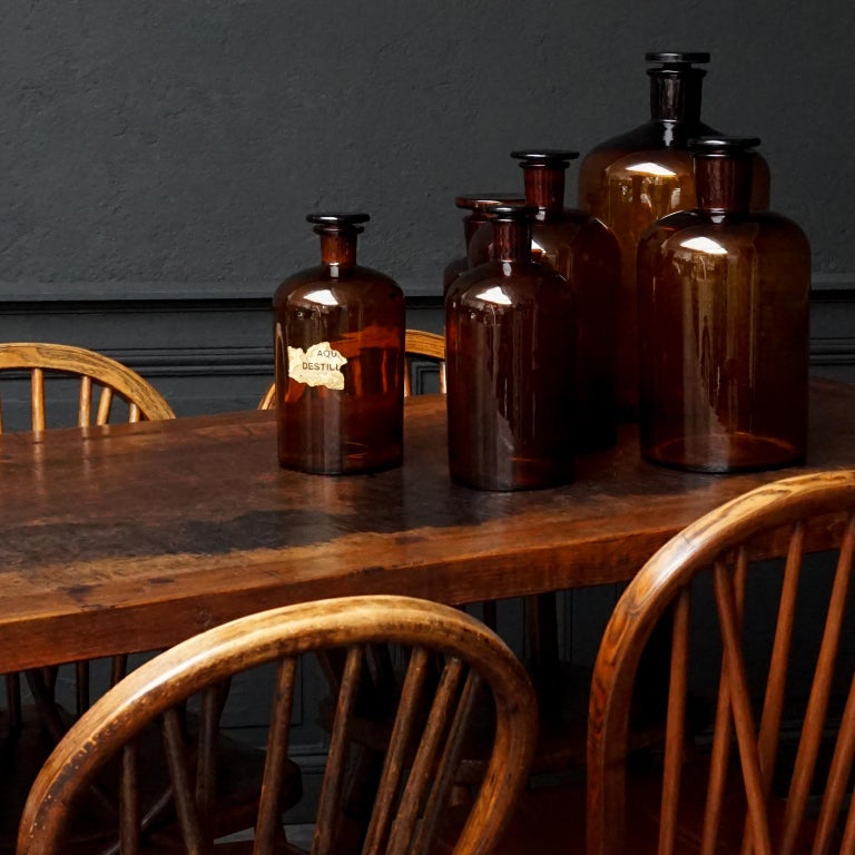 Set of Six Large Early 20th Century German Amber Glass Apothecary Jars with Lid For Sale 2