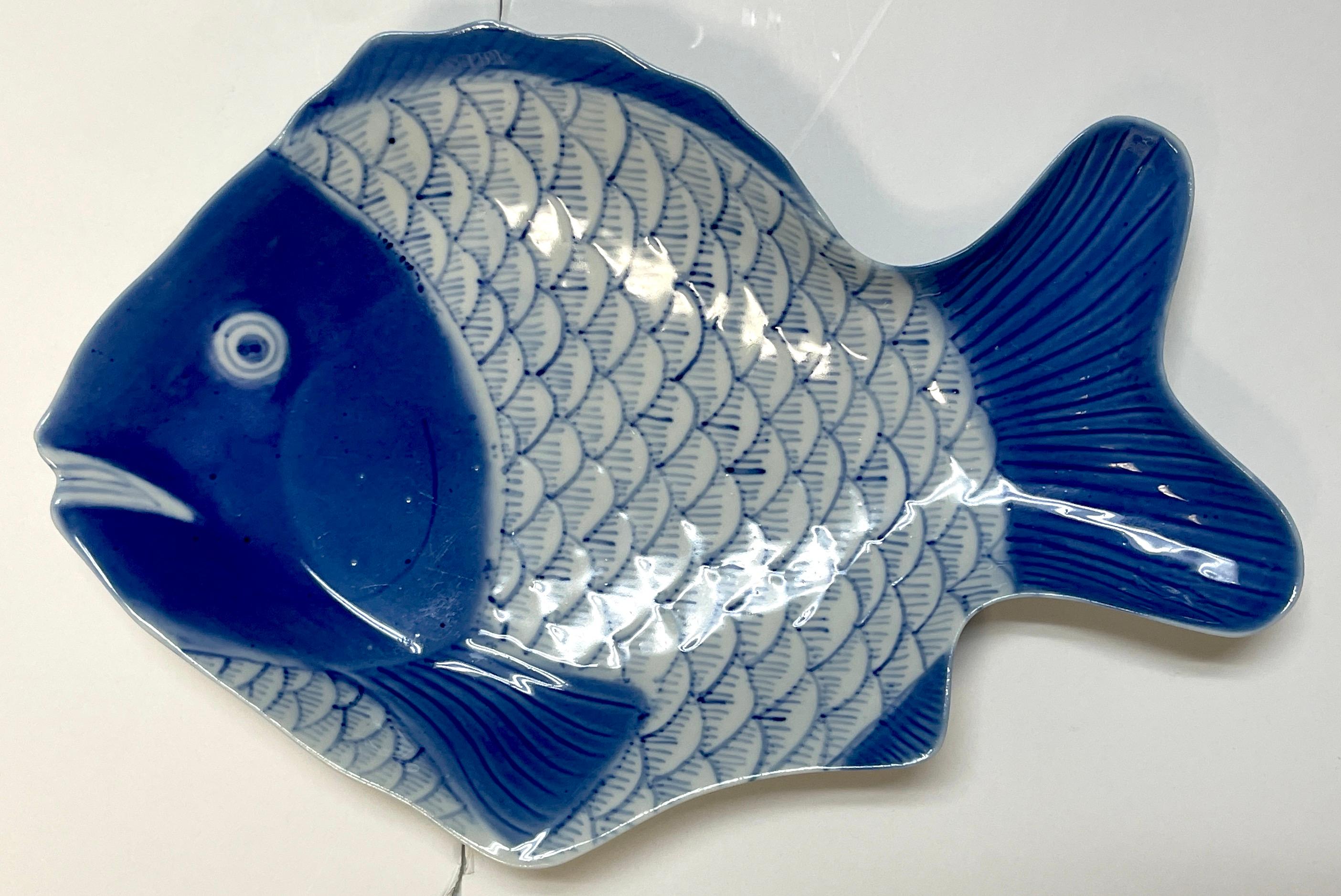 blue and white fish plates