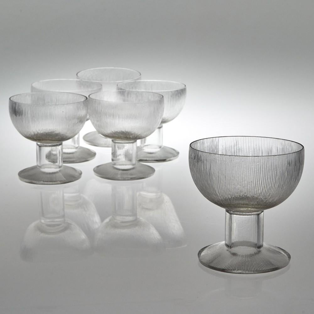 A set of six Rene Lalique Wingen pattern glasses designed in 1926 in Wingen-sur-Moder, Alsace, France. Moulded mark R LALIQUE on the base and engraved R Lalique France Nr5109

Condition : Excellent, no chips or cracks. The outside edge of the