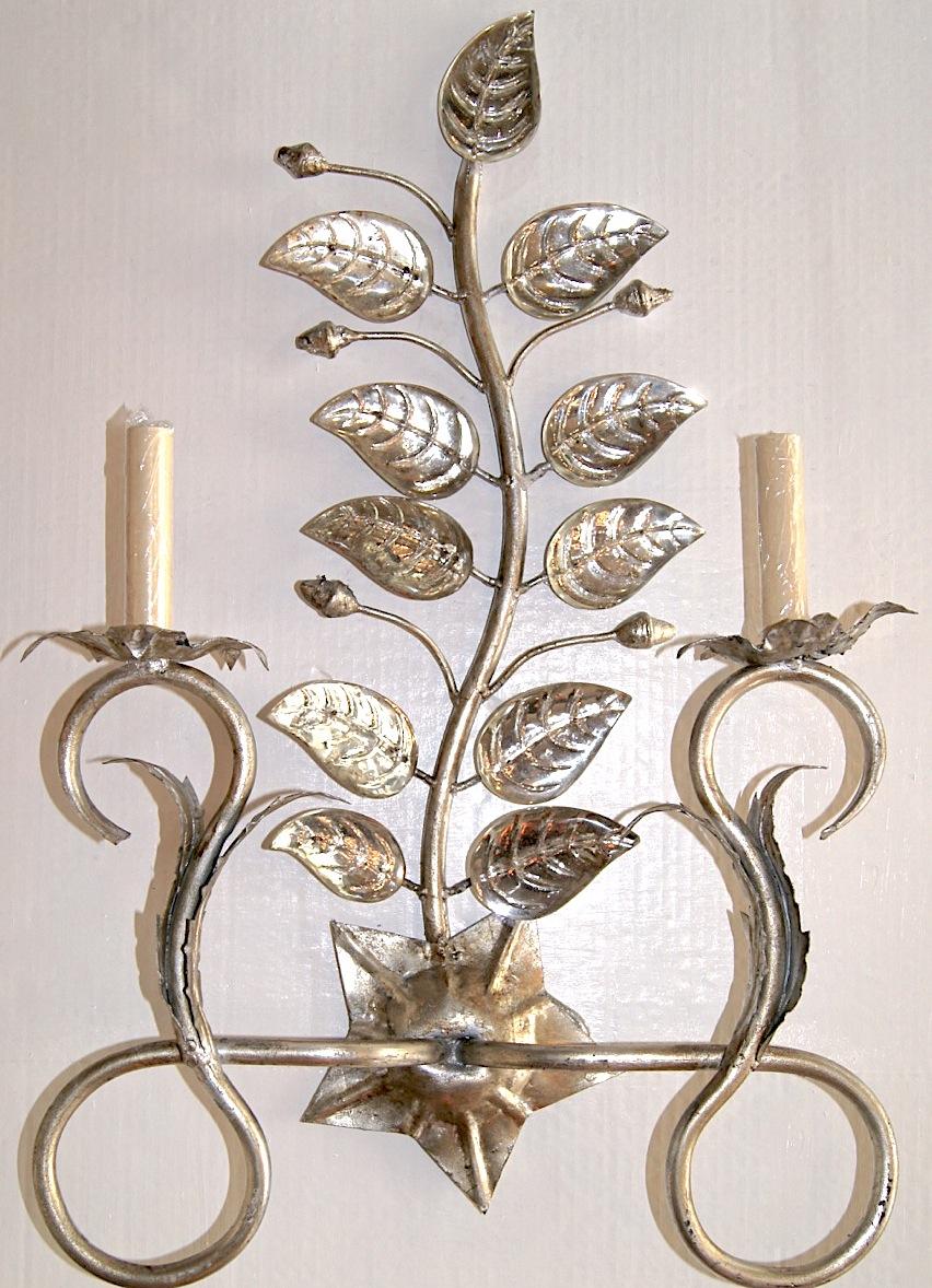 Set of six circa 1940's Italian silver-leafed metal sconces with molded glass leaves and two lights each. Sold per pair.

Measurements:
Height: 26