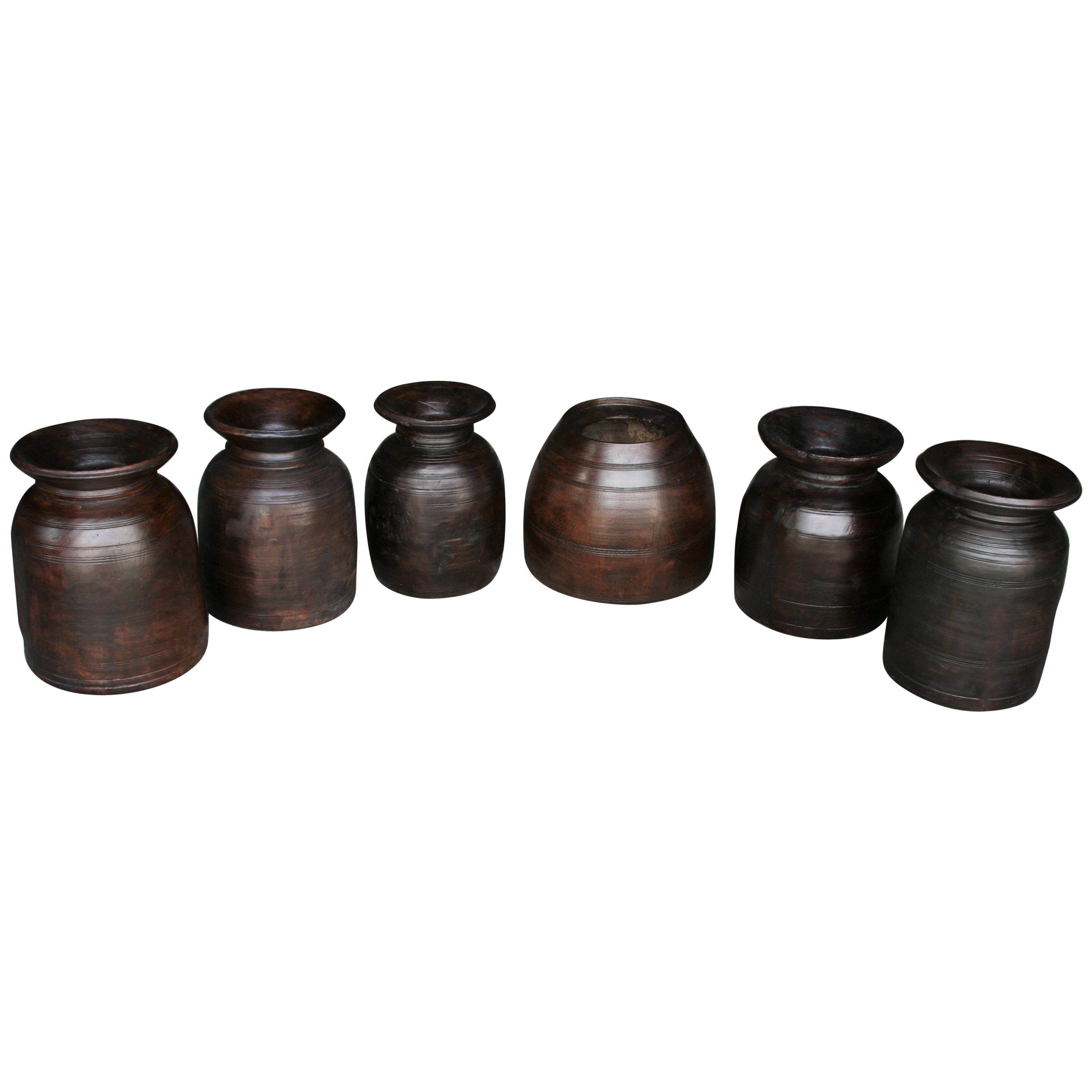 Set of Six Late 19th Century Hand Carved Wooden Pots from Naga Land            For Sale