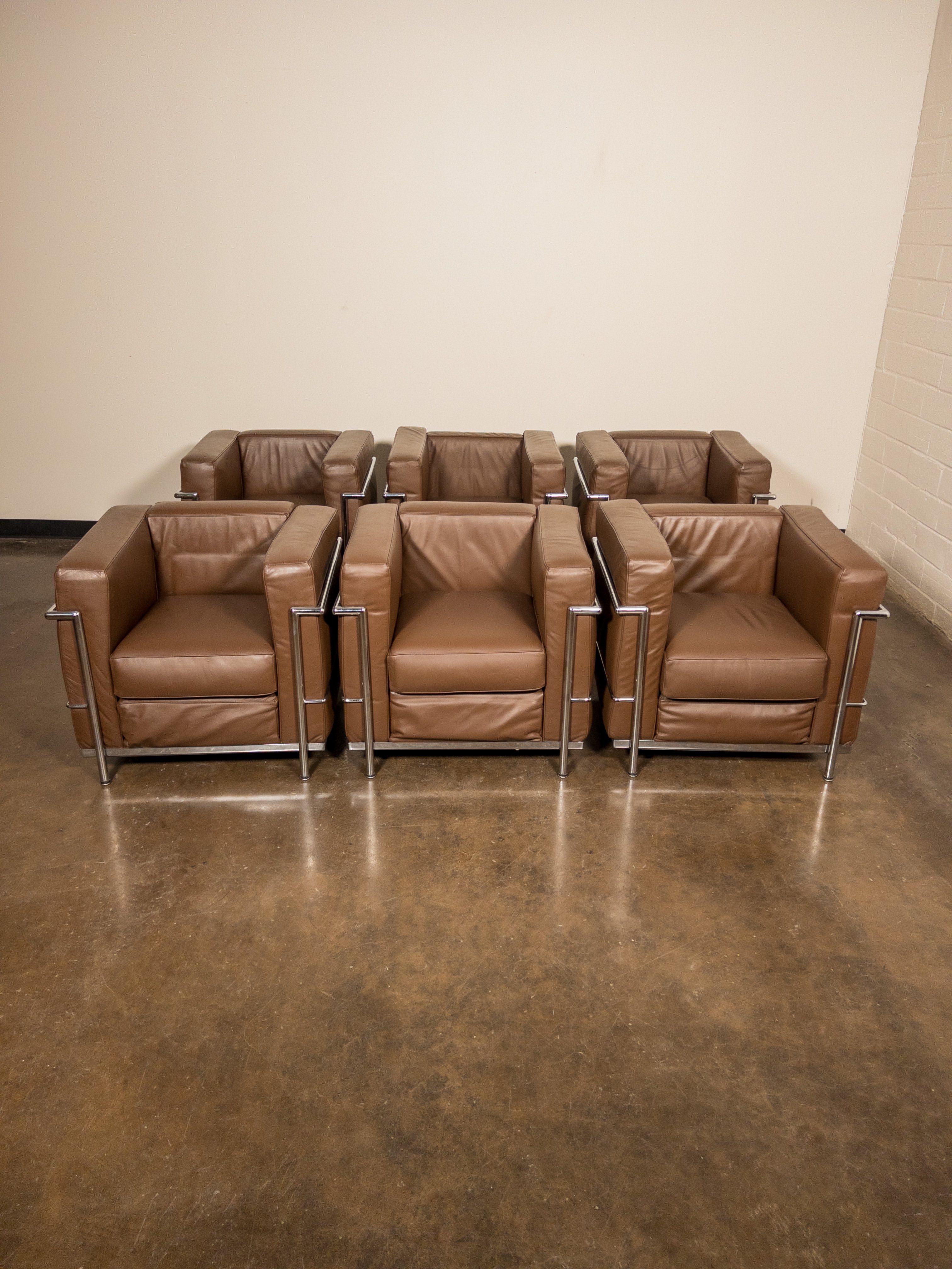 This comfortable set of six (6) Le Corbusier for Alivar 'LC2' Club Chairs in gorgeous thick Italian brown leather, priced in this listing as a set. See our other listings for these priced per pair or contact us for details. 

Alivar was one of the