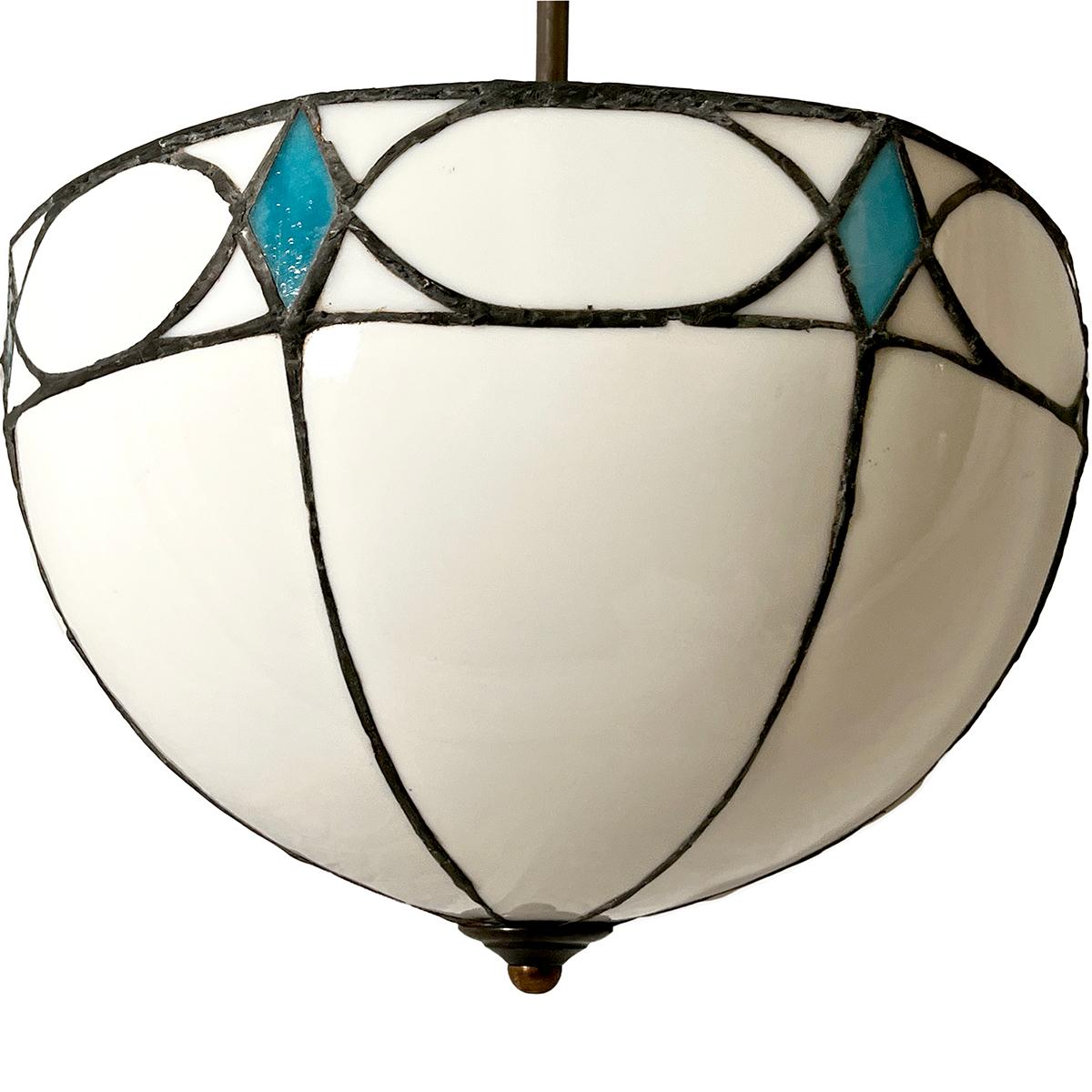 A set of six circa 1920’s English leaded glass light fixture with 4 interior lights each and blue glass details. Sold individually.

Measurements:
Height: 16″
Diameter: 16″