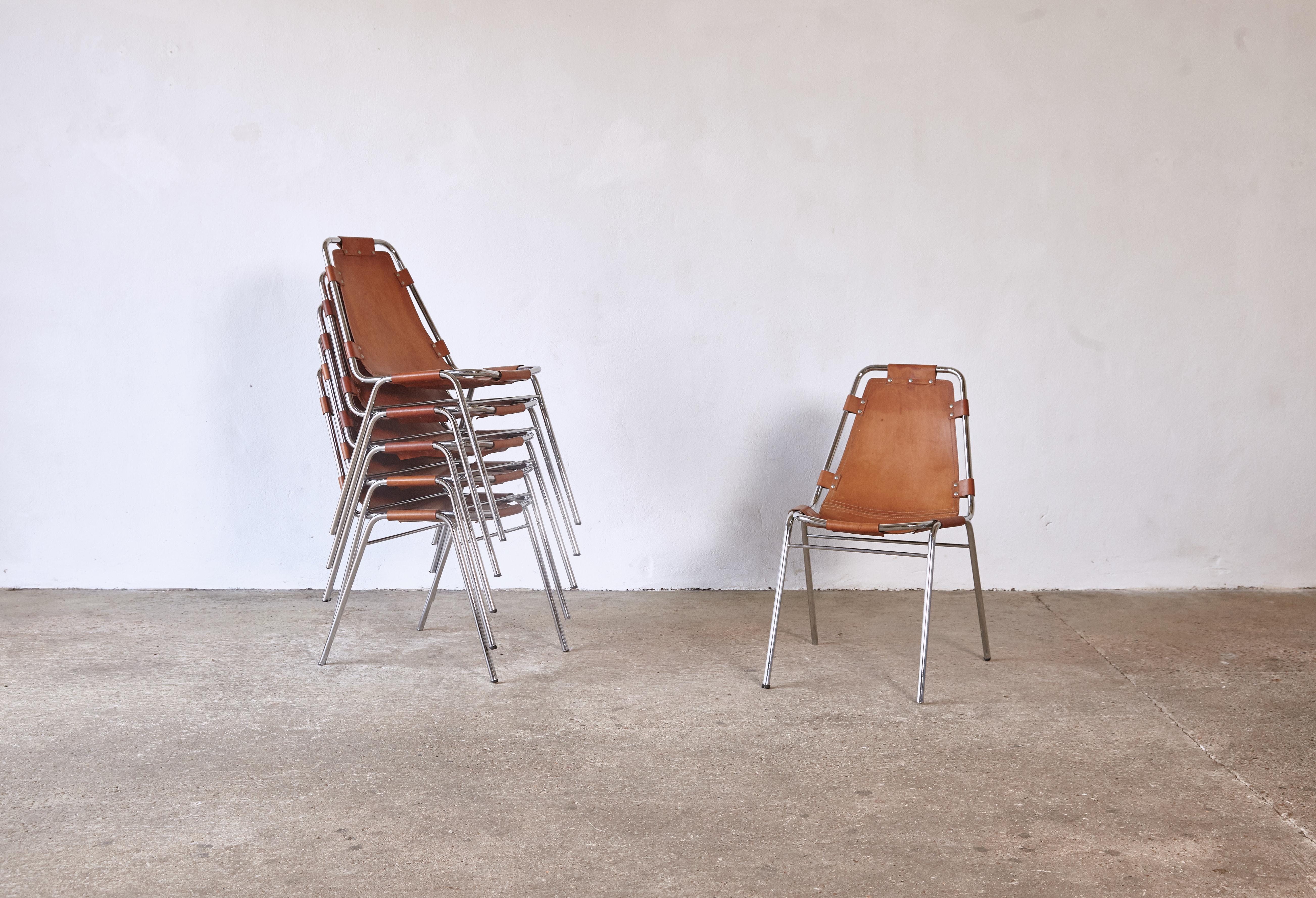 A superb set of six original Les Arcs chairs rarely found in such great condition. Tubular steel and cognac leather, France/Italy. Marked 1972. 

Les Arcs was a project on which Charlotte Perriand collaborated with some other architects who