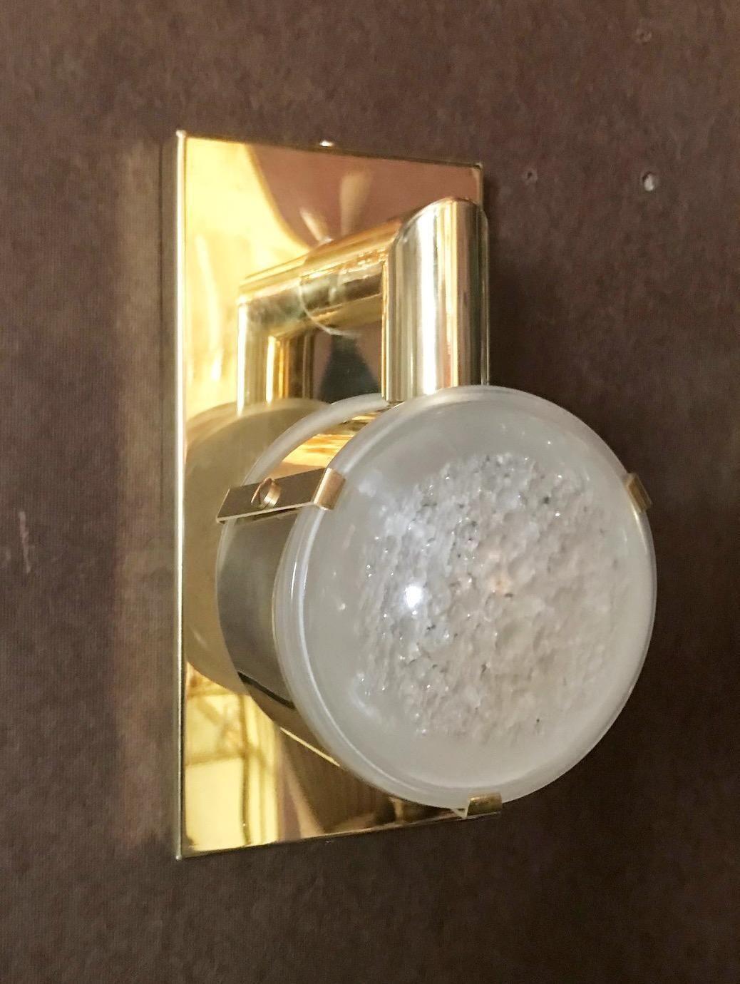 Sconce w/ double frosted murano glass, circa 1990's.


Limited edition sconces with double murano frosted glass lenses on semi-polished brass brackets / Made in Italy 1 light rotatable.