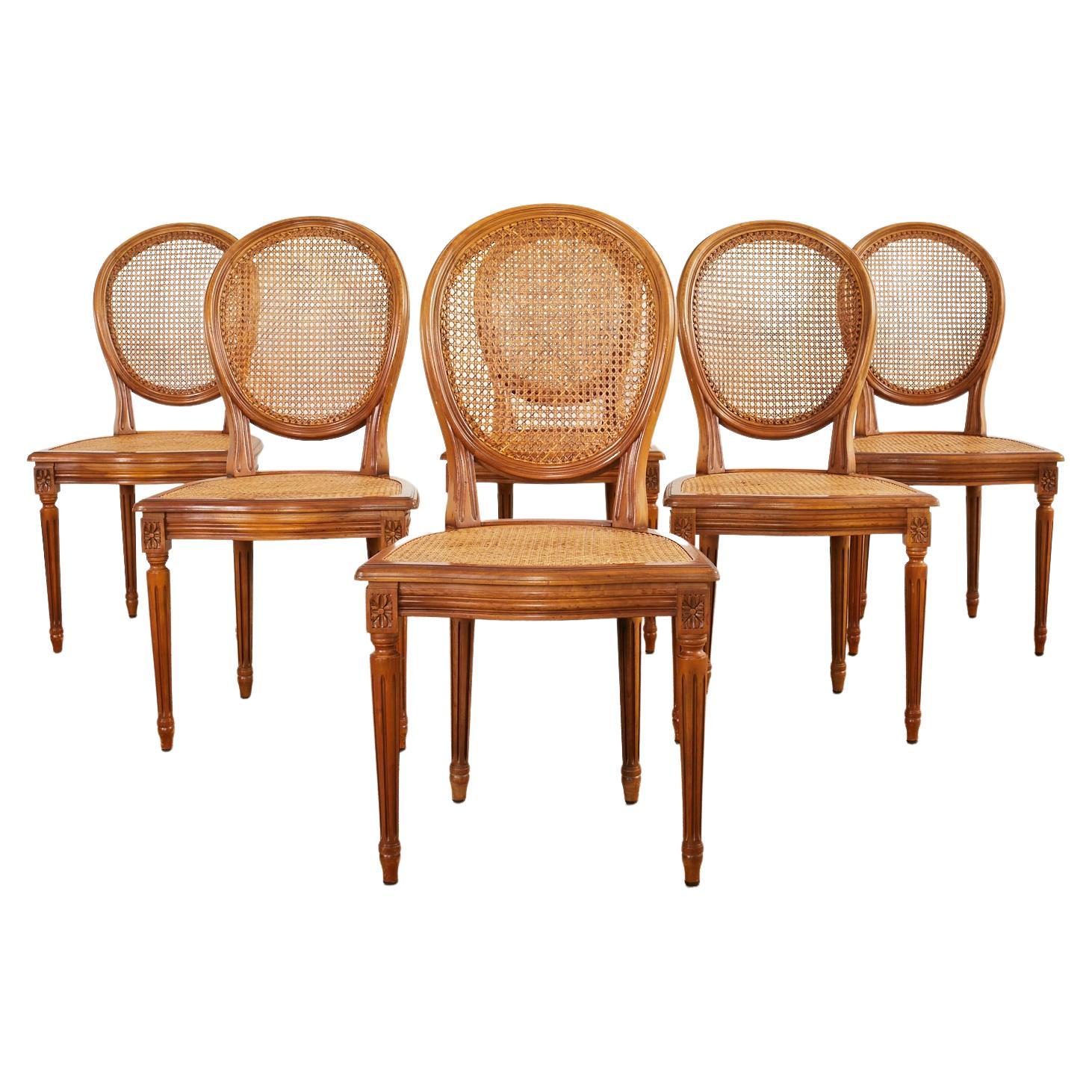 Set of Six Louis XVI Style Fruitwood Caned Dining Chairs