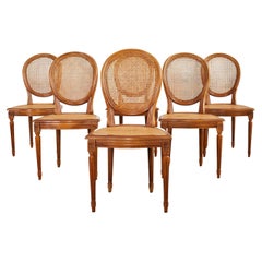Set of Six Louis XVI Style Fruitwood Caned Dining Chairs 