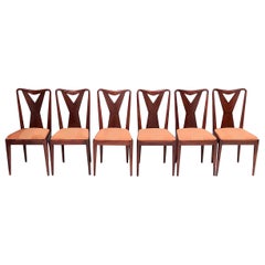 Satz von sechs Esszimmerstühlen aus Nussbaumholz mit orangefarbenem Stoff im Stil von Parisi, Italien