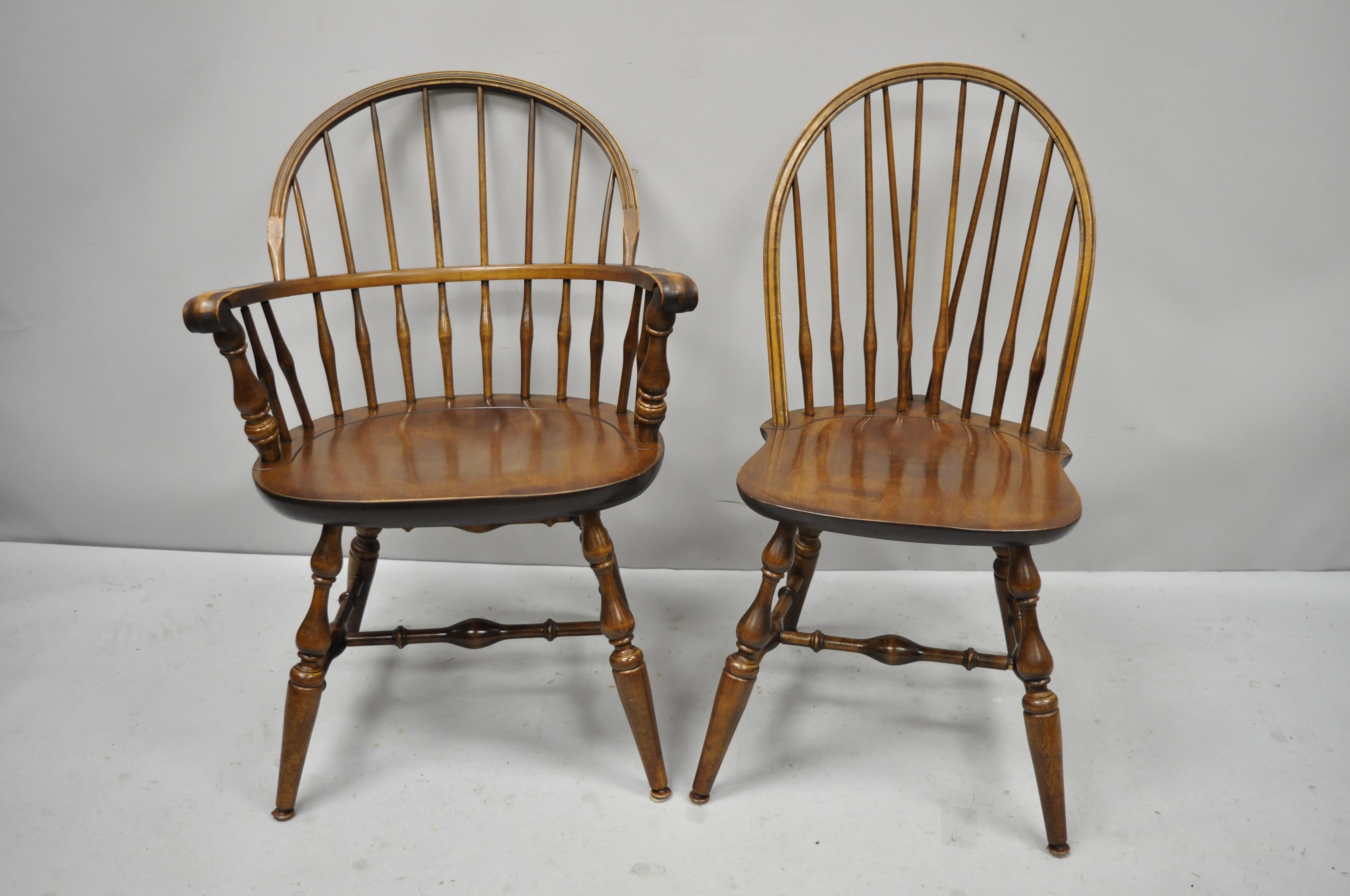 Set of six Nichols & Stone American Colonial Windsor spindle back maple dining chairs. Listing features (2) armchairs, (4) side chairs, solid wood construction, beautiful wood grain, original stamp, very nice vintage item, quality American
