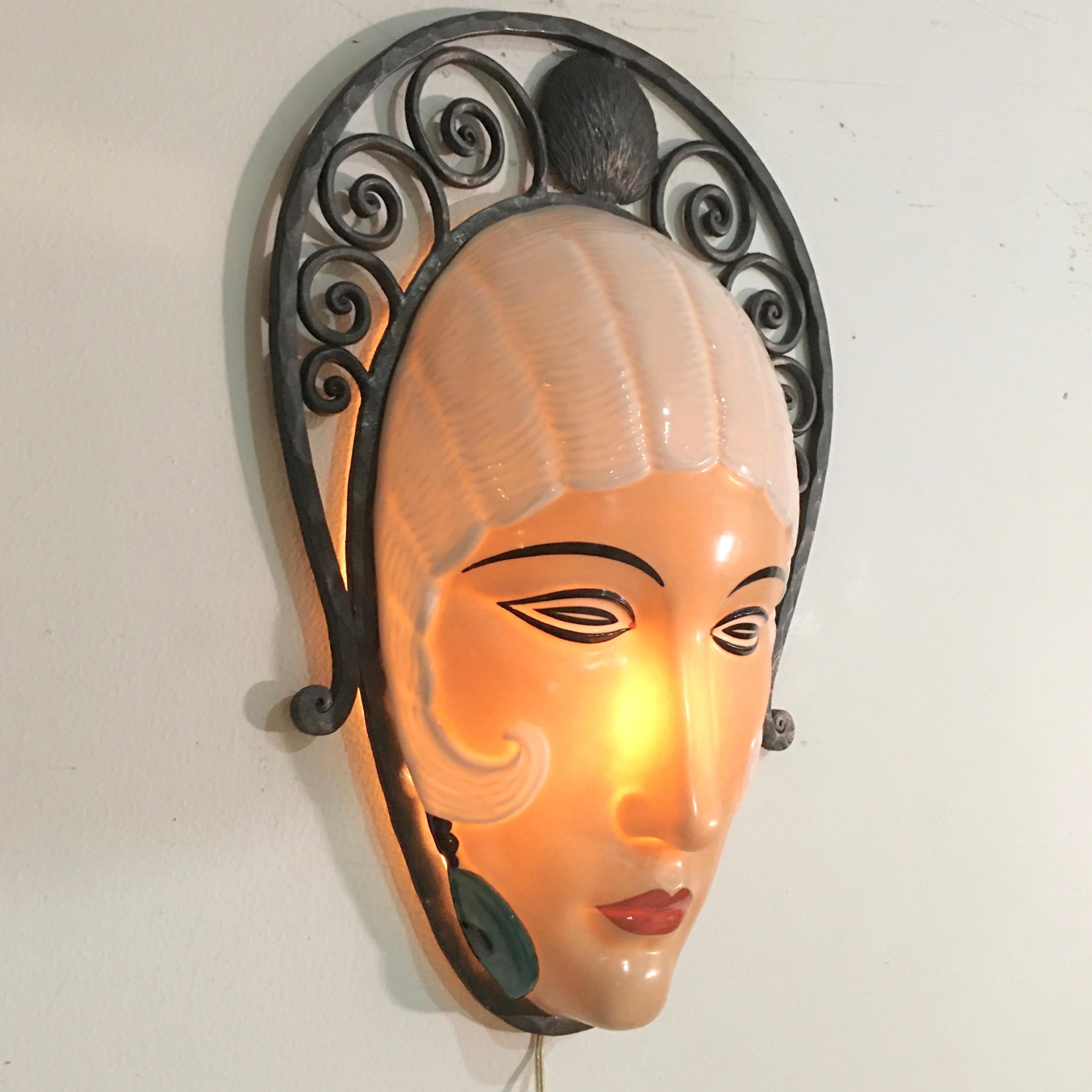 French Set of Seven Marcel Bever Art Deco Mask Wall Lights