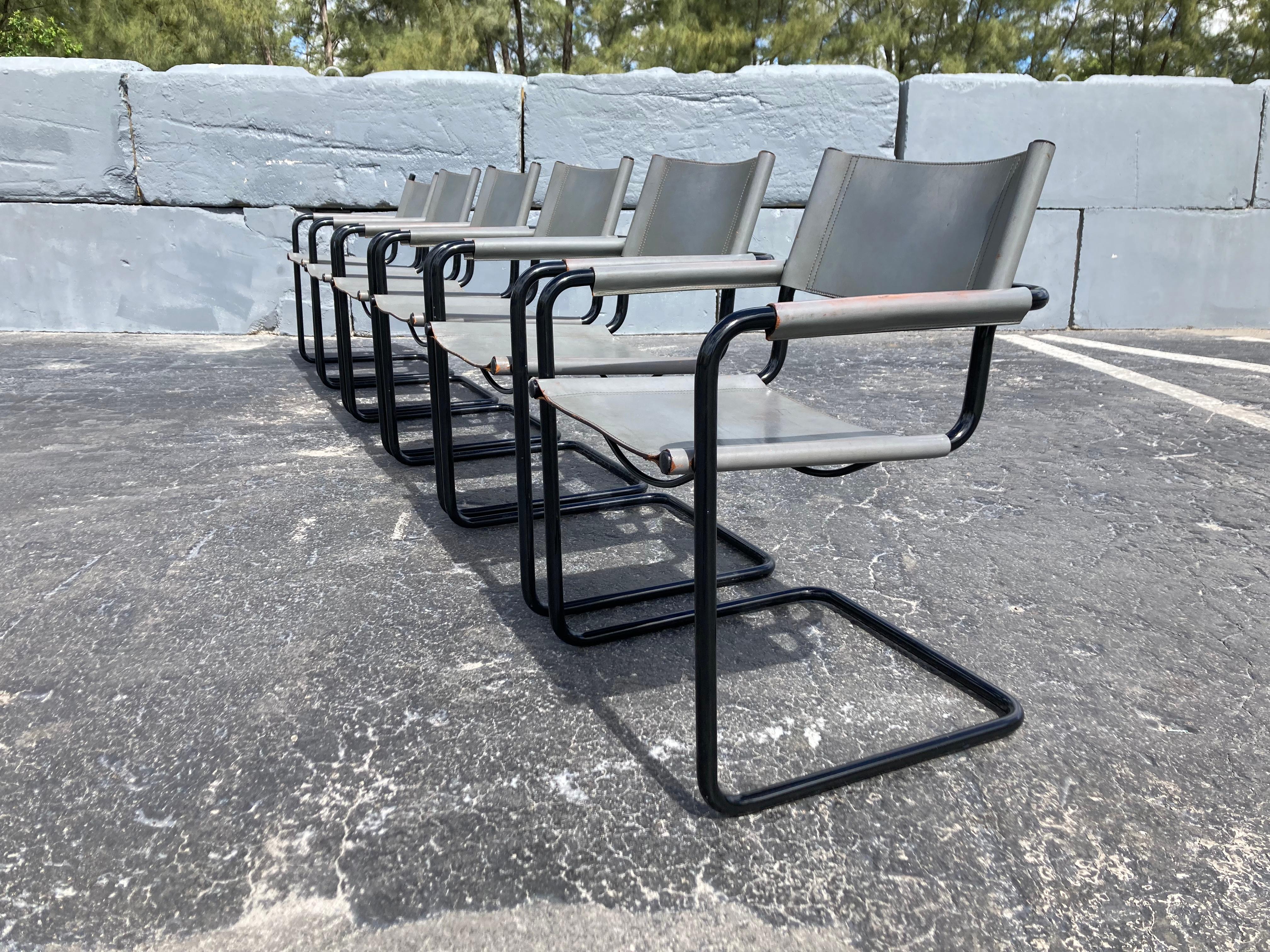 Set of six Mart Stam chairs. Grey leather and black tubular metal. Ready for a new home, Leather has a strong patina, please see pictures. Metal has normal wear.