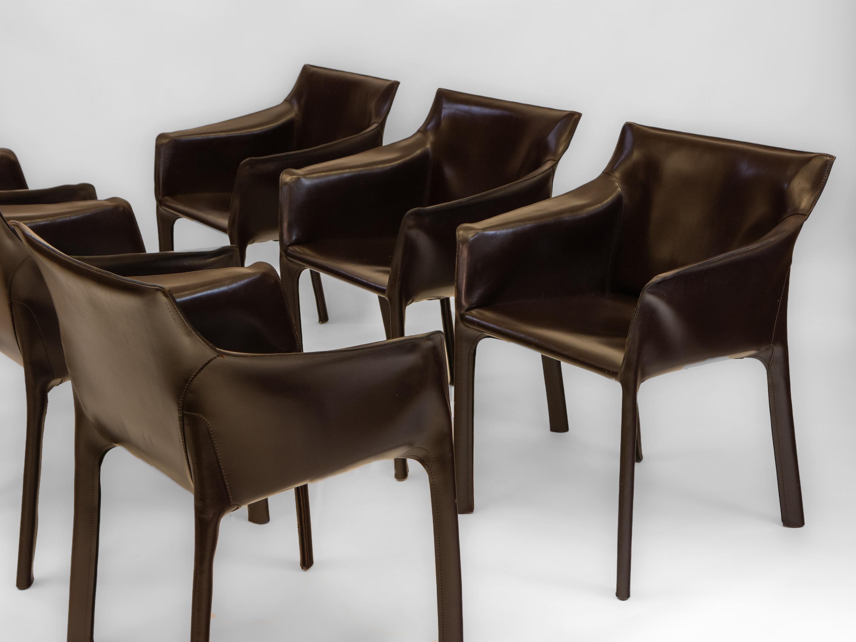 Vintage set of six Italian dark brown saddle leather cab 413 chairs by Matteo Grassi. Circa 1980's. Embossed stamped 'Matteograssi' to each chair. 

In the late 1970s, the name Matteo Grassi came to mean excellence worldwide for his distinctive and