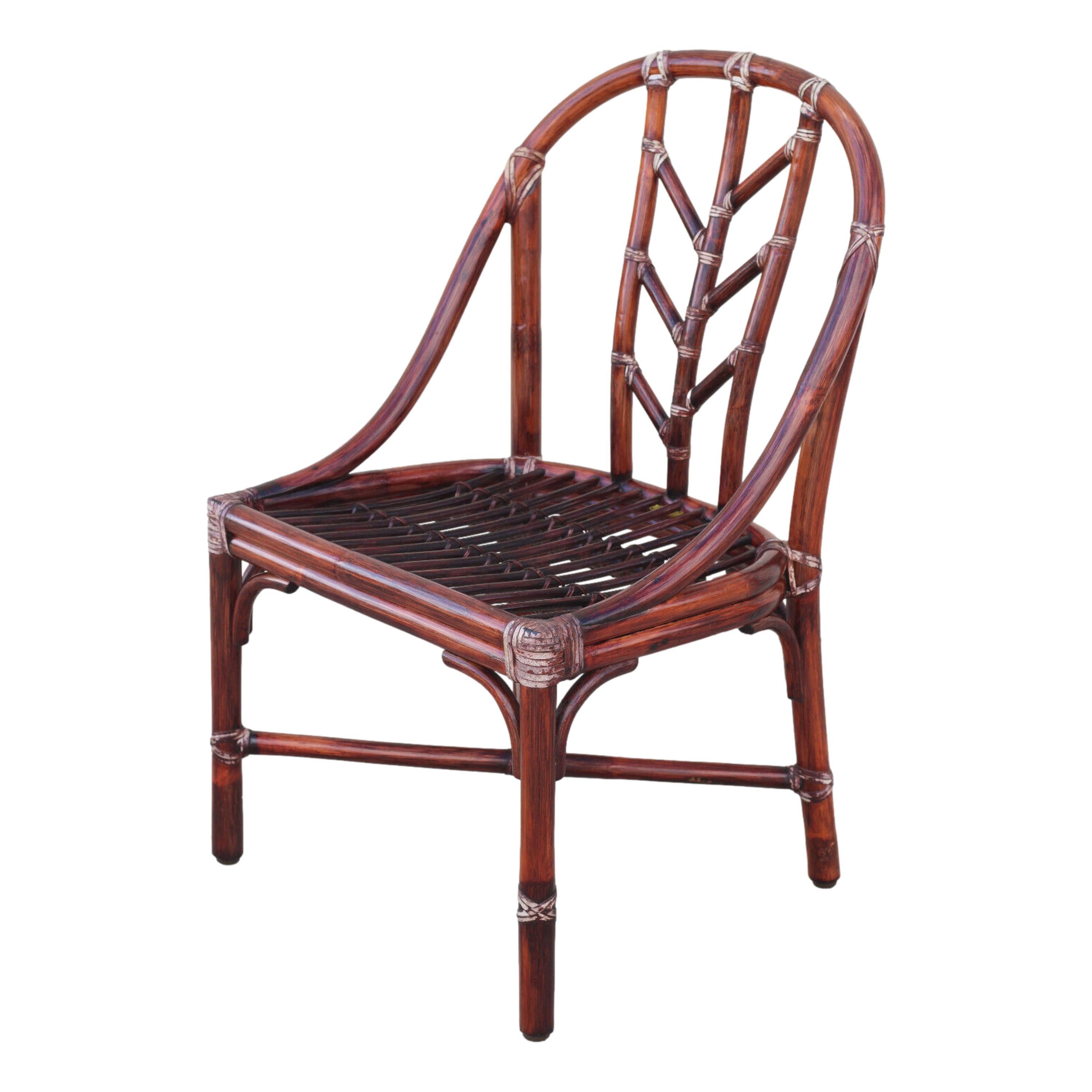 A rare set of six organic modern M-74 dining chairs designed by breakthrough innovator Elinor McGuire for McGuire San Francisco. The handcrafted chairs have their original finish, Cordova, a rich reddish brown. Features include McGuire’s signature