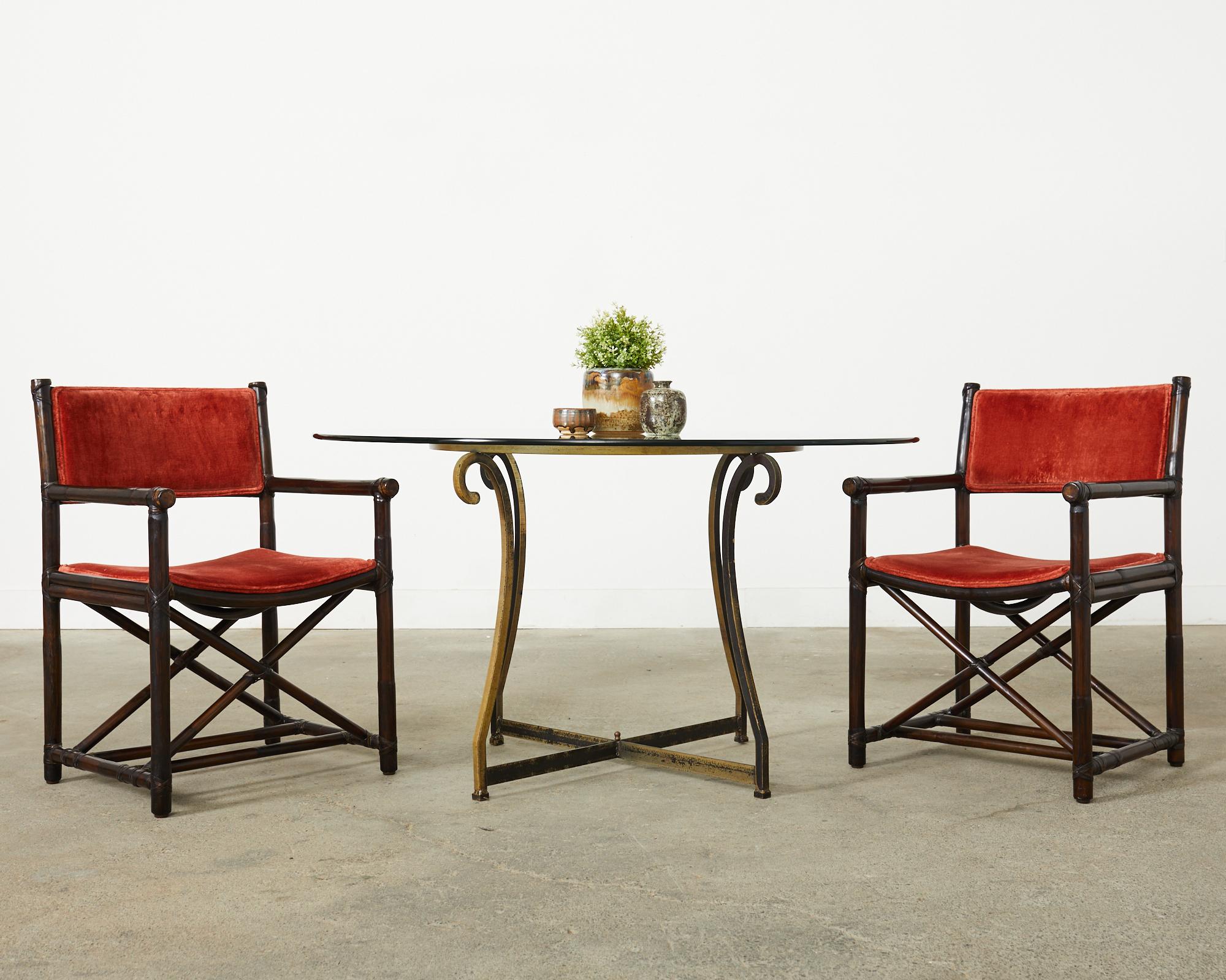 Rare set of six bespoke rattan directors style dining chairs made in the California organic modern style by McGuire San Francisco, CA. The chairs feature thick pole rattan frames with woven honeycomb cane insets. The set consists of four side chairs